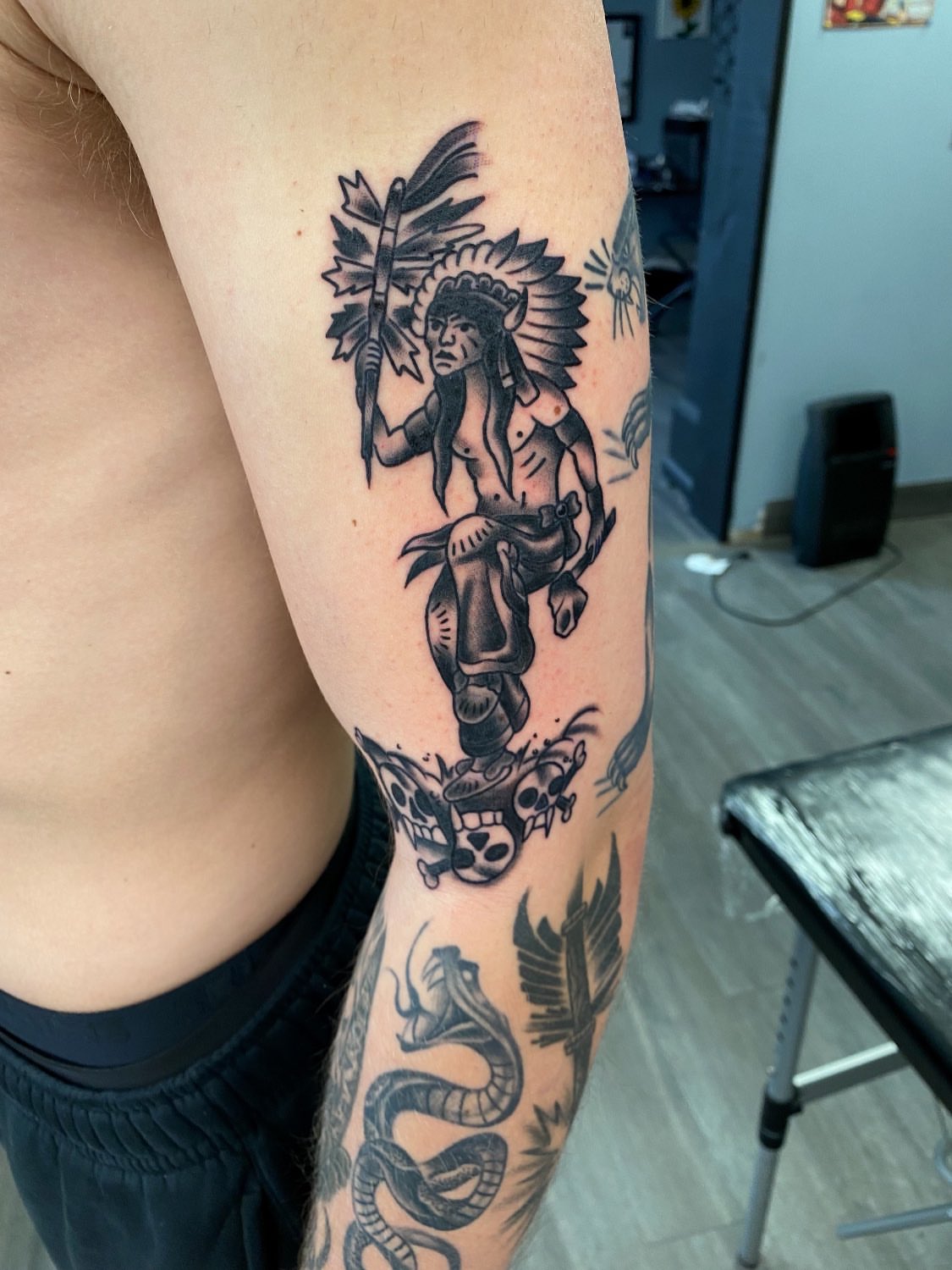 Indian warrior American traditional tattoo on the forearm by Kelan Mckenna