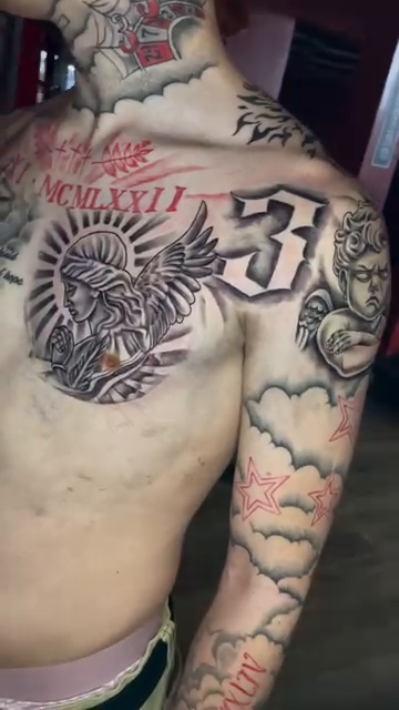 Realism tattoo on the chest by Inkman Parson