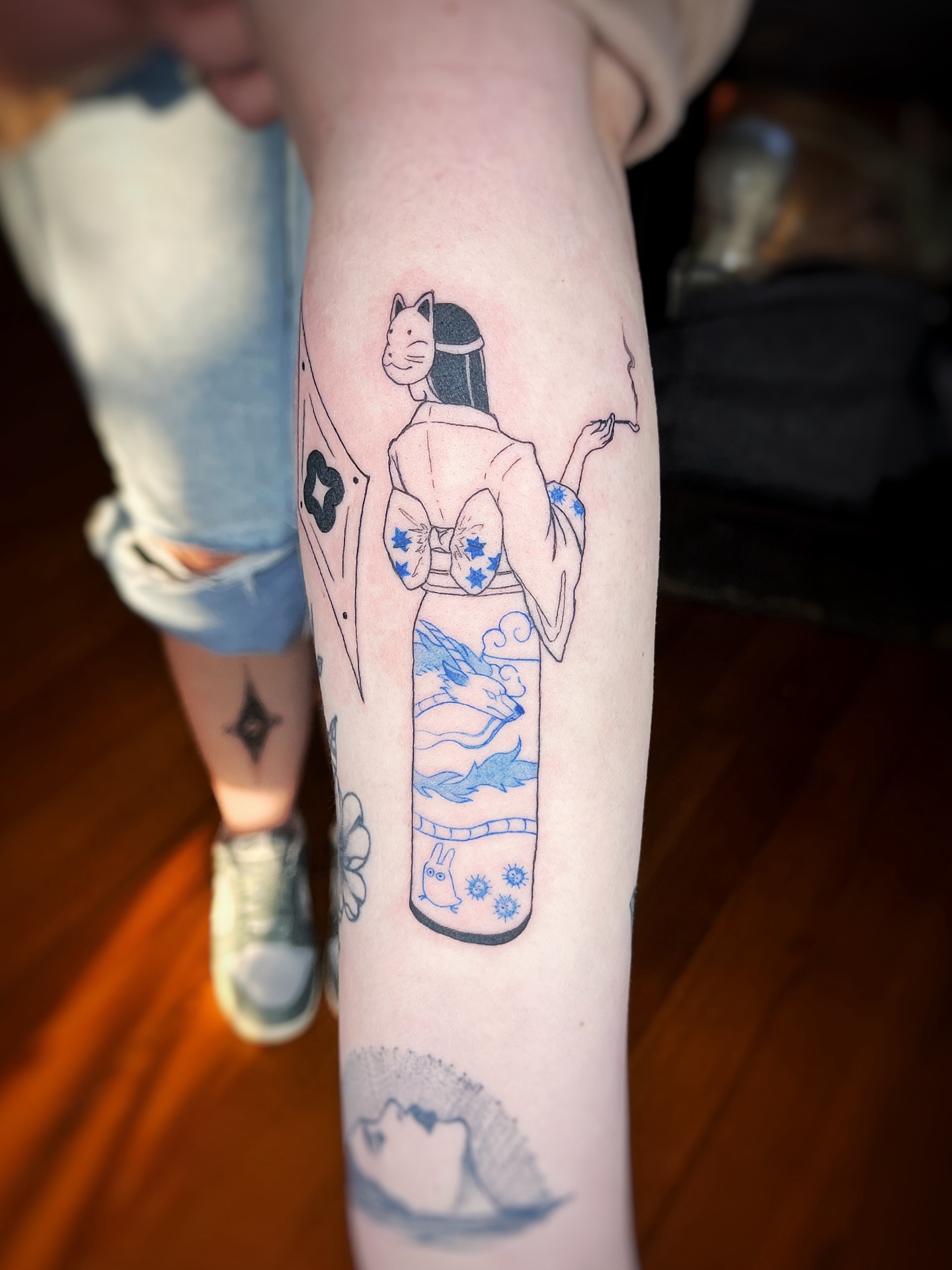 Geisha with cat head japanese irezumi tattoo on the forearm by Risa Cincinnati Tattoo Artist