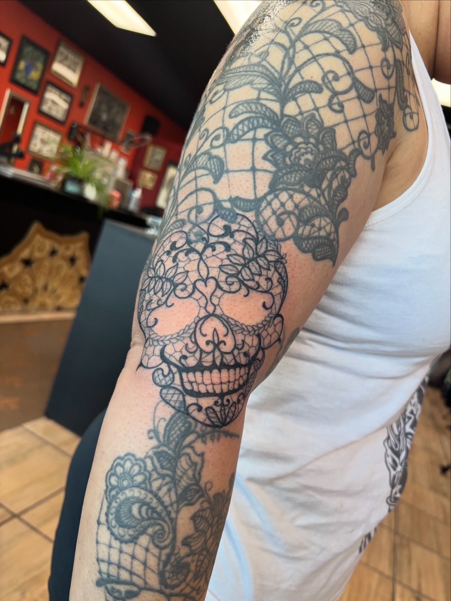 Lacy skull ornamental tattoo on the upper arm by Samantha💋🥀