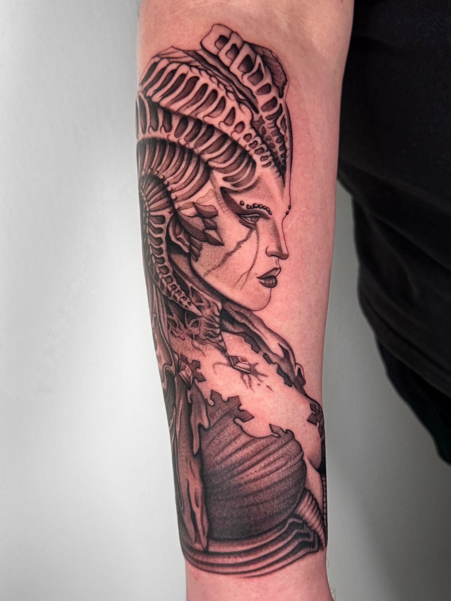 Woman with mechanical headdress realism tattoo on the forearm by Austin Tattoo Artist, Austin, Texas