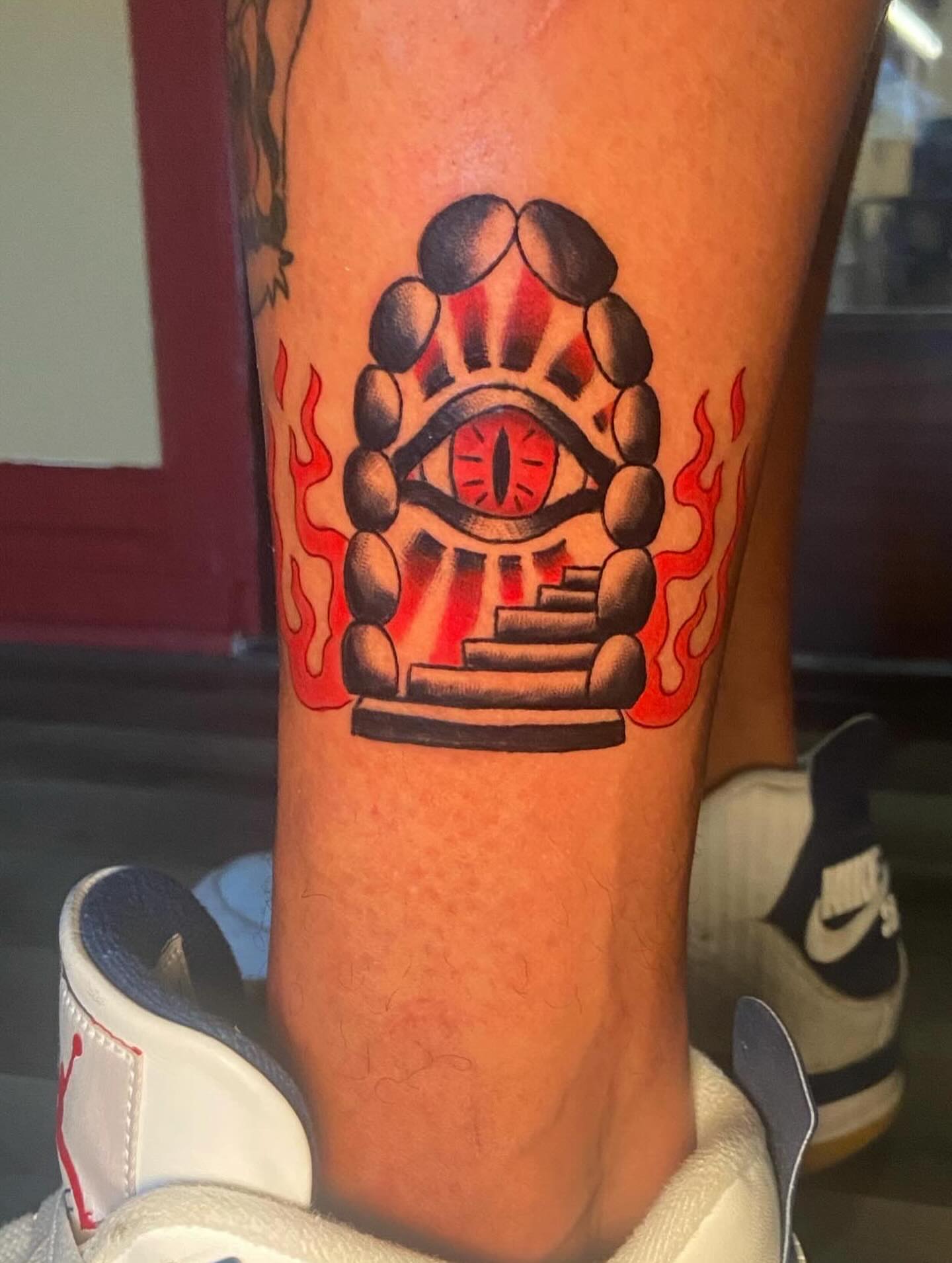 Eye with flame neo-traditional tattoo on the forearm by 🐆Cam Feral Tattoos