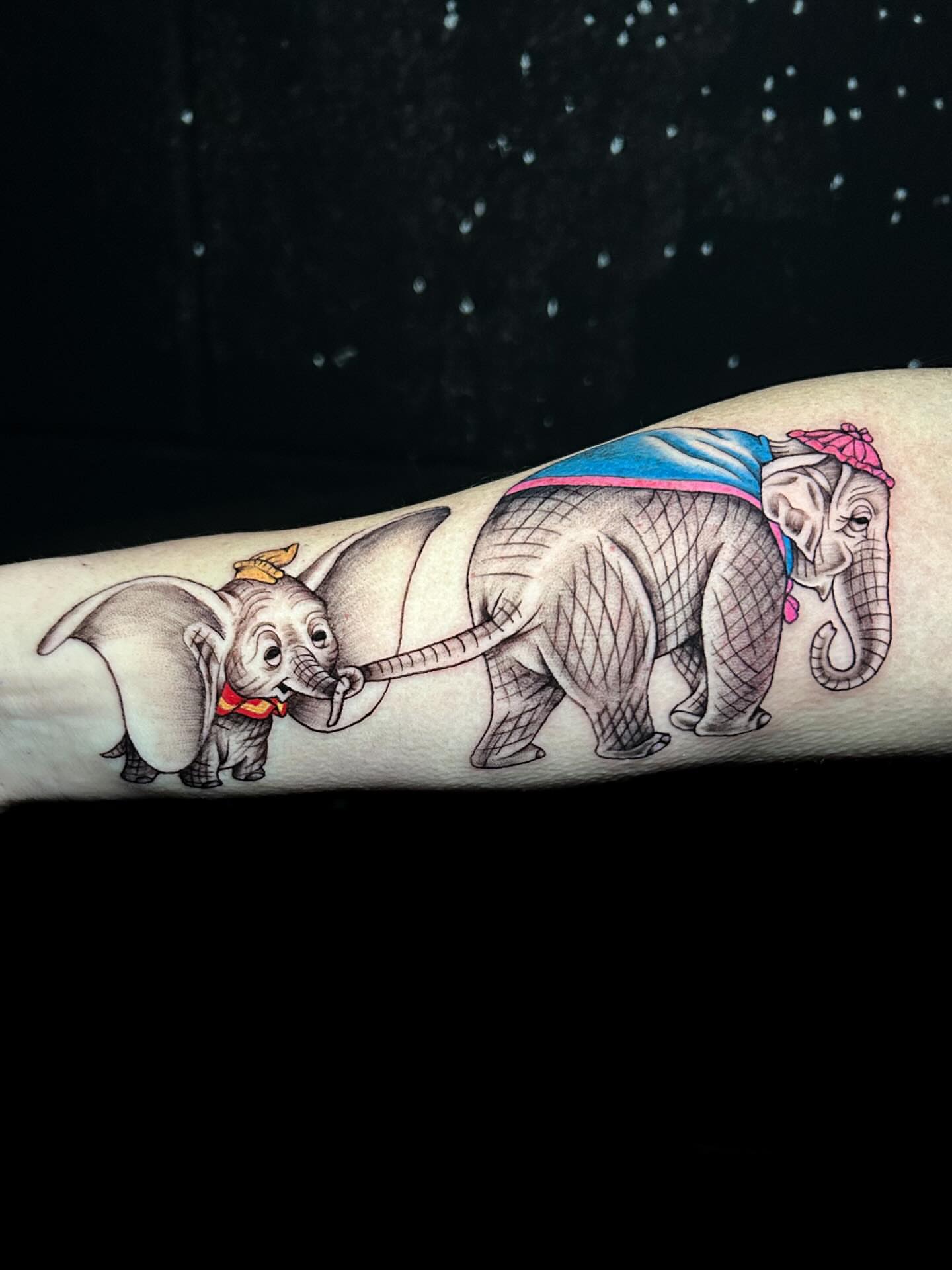 Elephant and baby elephant realism tattoo on the forearm by Maia Pizarro