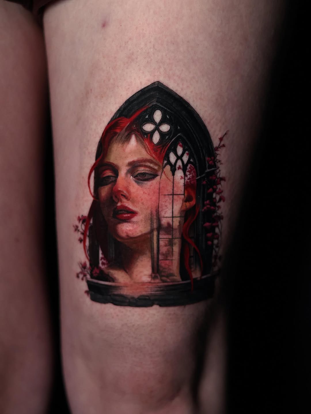Gothic portrait with stained glass window surrealism tattoo on the thigh by Austin Jones