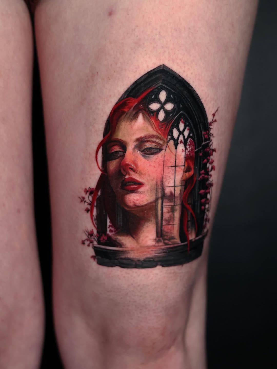 Woman's portrait through a gothic window neo-traditional tattoo on the thigh by Austin Jones