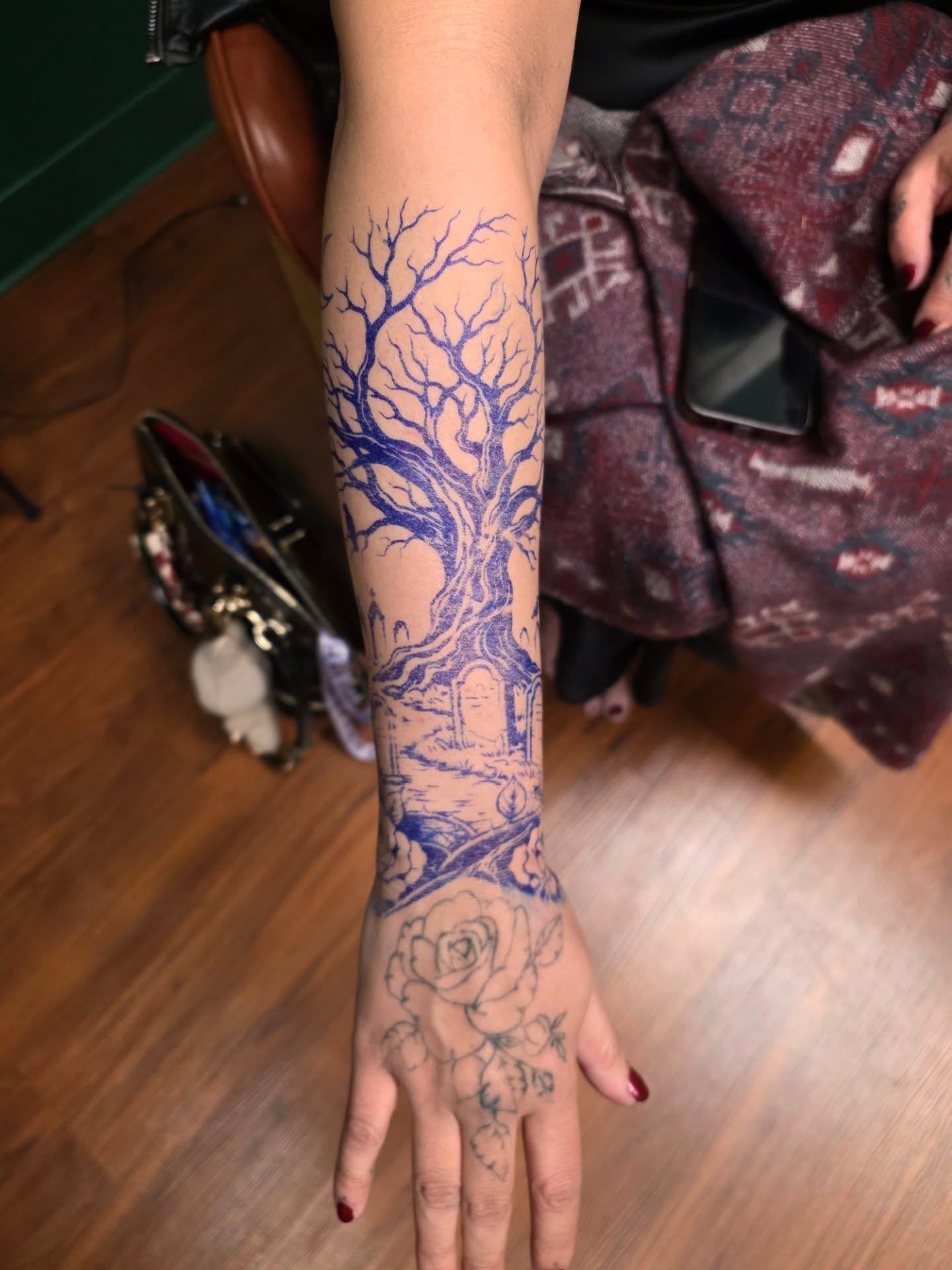 Tree and rose black and grey tattoo on the forearm by Nick de Hoyos
