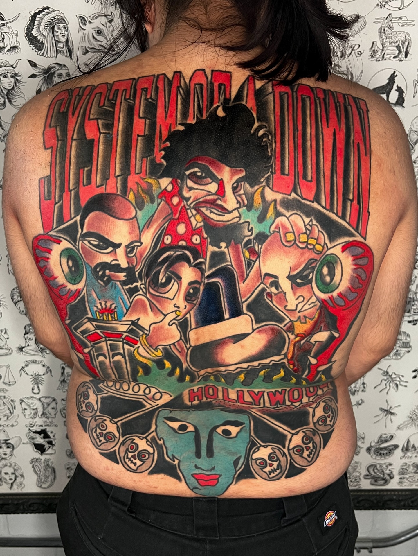 System of a Down band members illustrative tattoo on the back by Nestor Zelaya