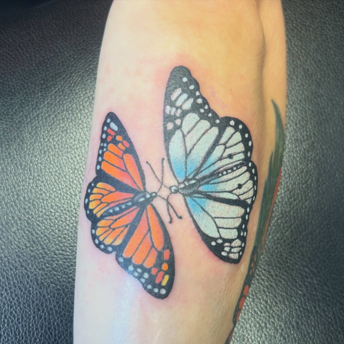 Butterflies dotwork tattoo on the forearm by Sean Rakos, Austin, Texas