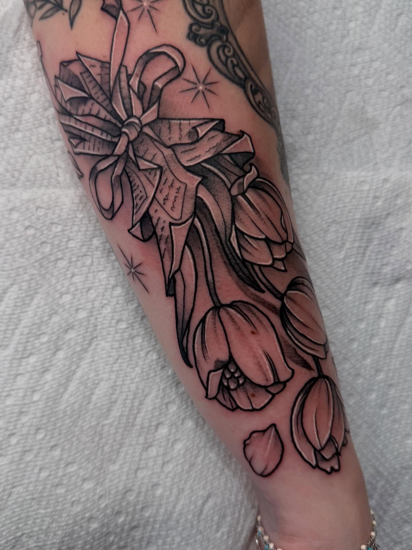 Tulips and ribbon realism tattoo on the forearm by 🦋ｊｅｓｓｉｃａ  f  o  x🦋, Nashville, Tennessee