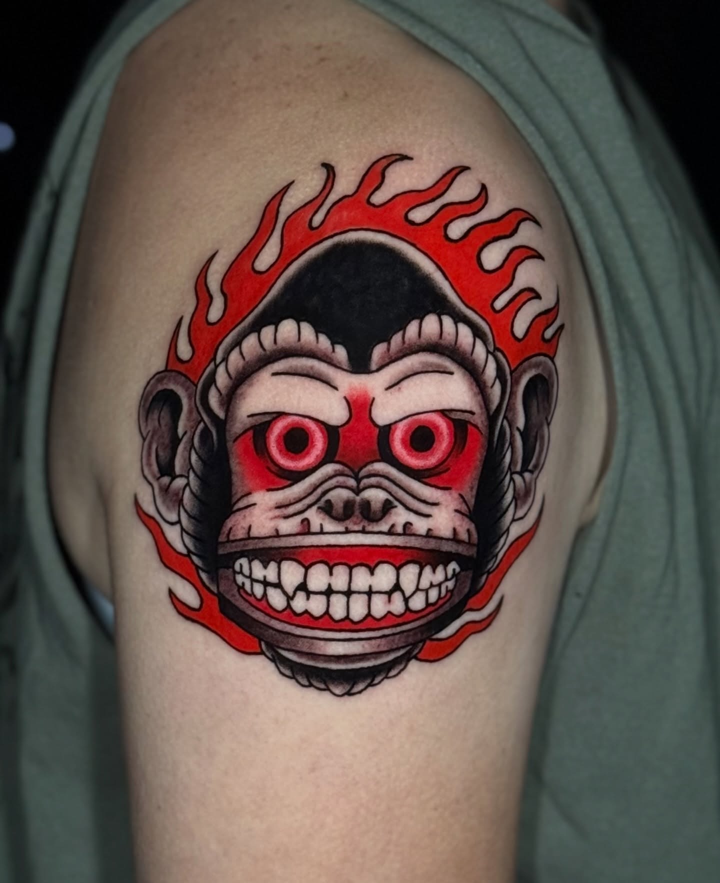 Monkey head American traditional tattoo on the shoulder by Brian Easlon
