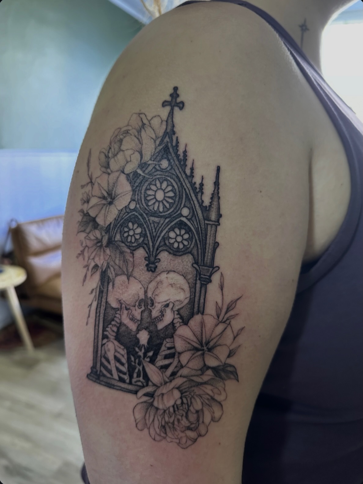 Skeleton couple in gothic window dark realism tattoo on the shoulder by Allexis