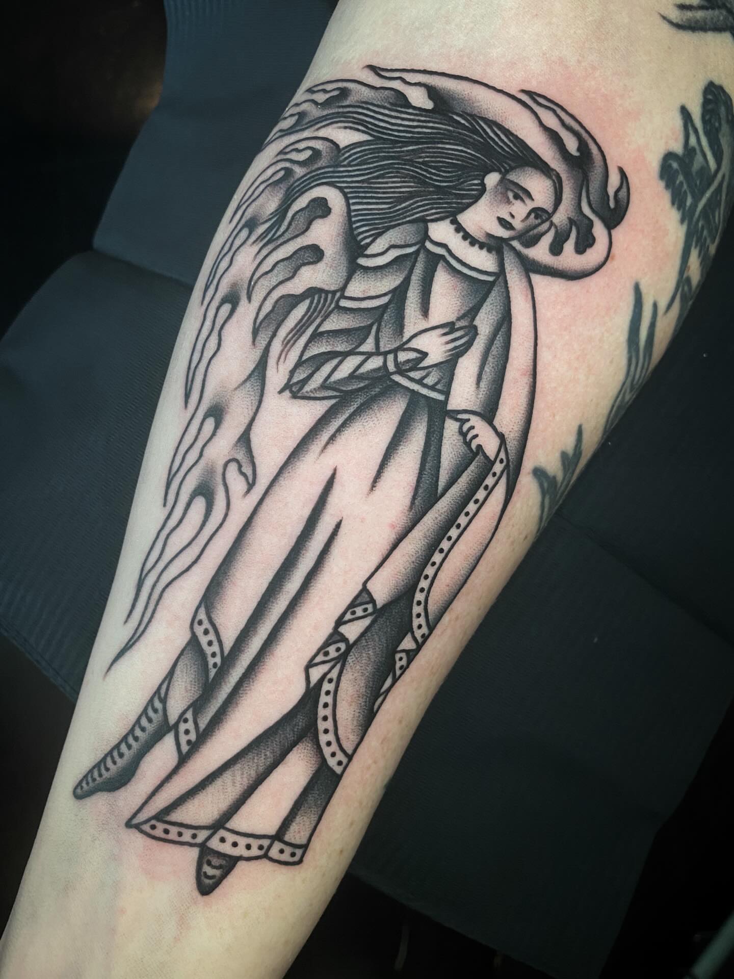 Angel black and grey tattoo on the forearm by Jaclin Grace Hastings