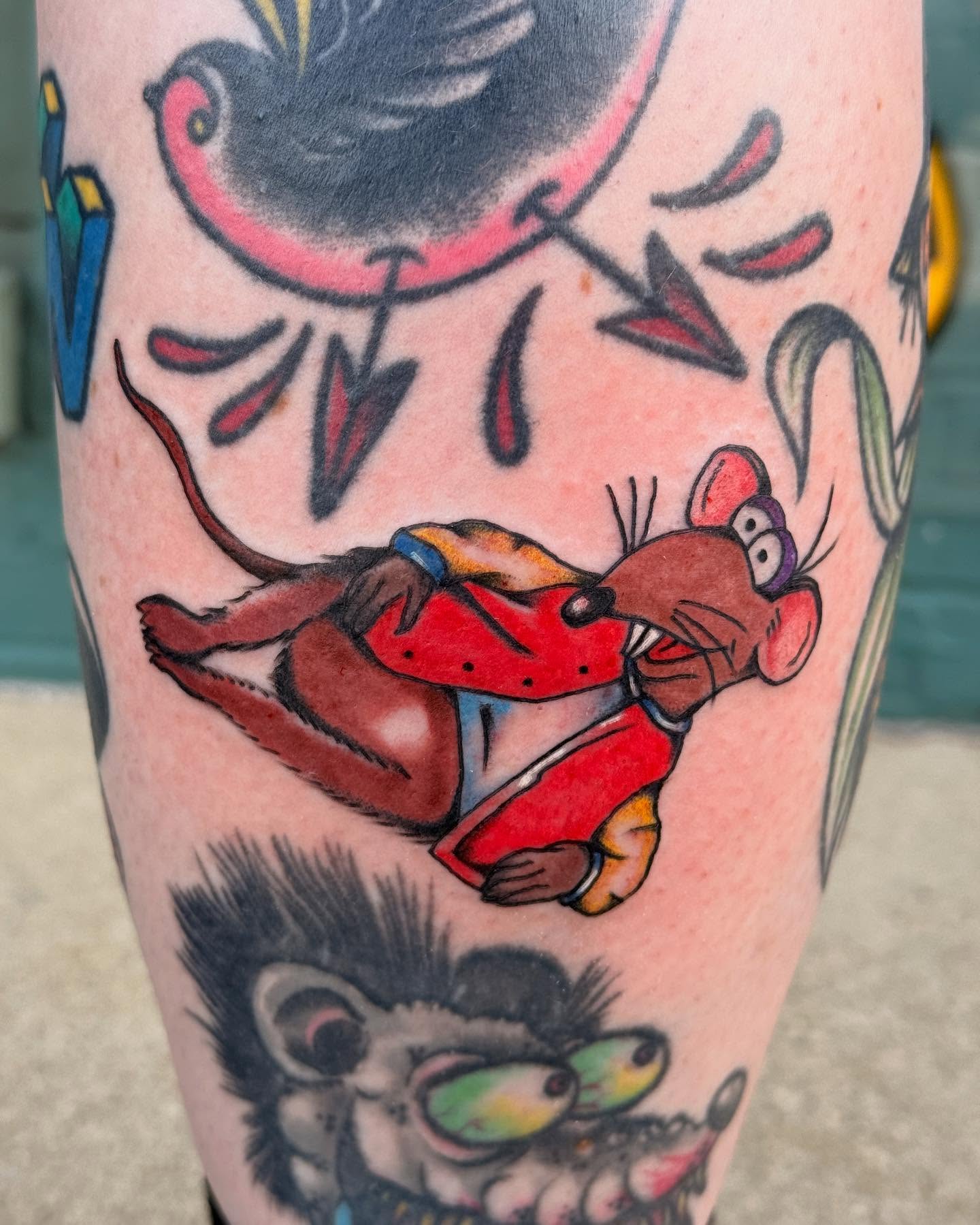 Mouse in red coat American traditional tattoo on the forearm by Megan Sue Causemaker