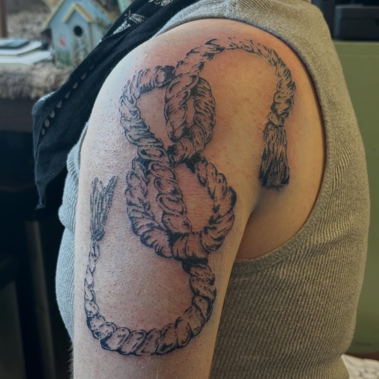 Rope black and grey tattoo on the shoulder by Jules🕯️