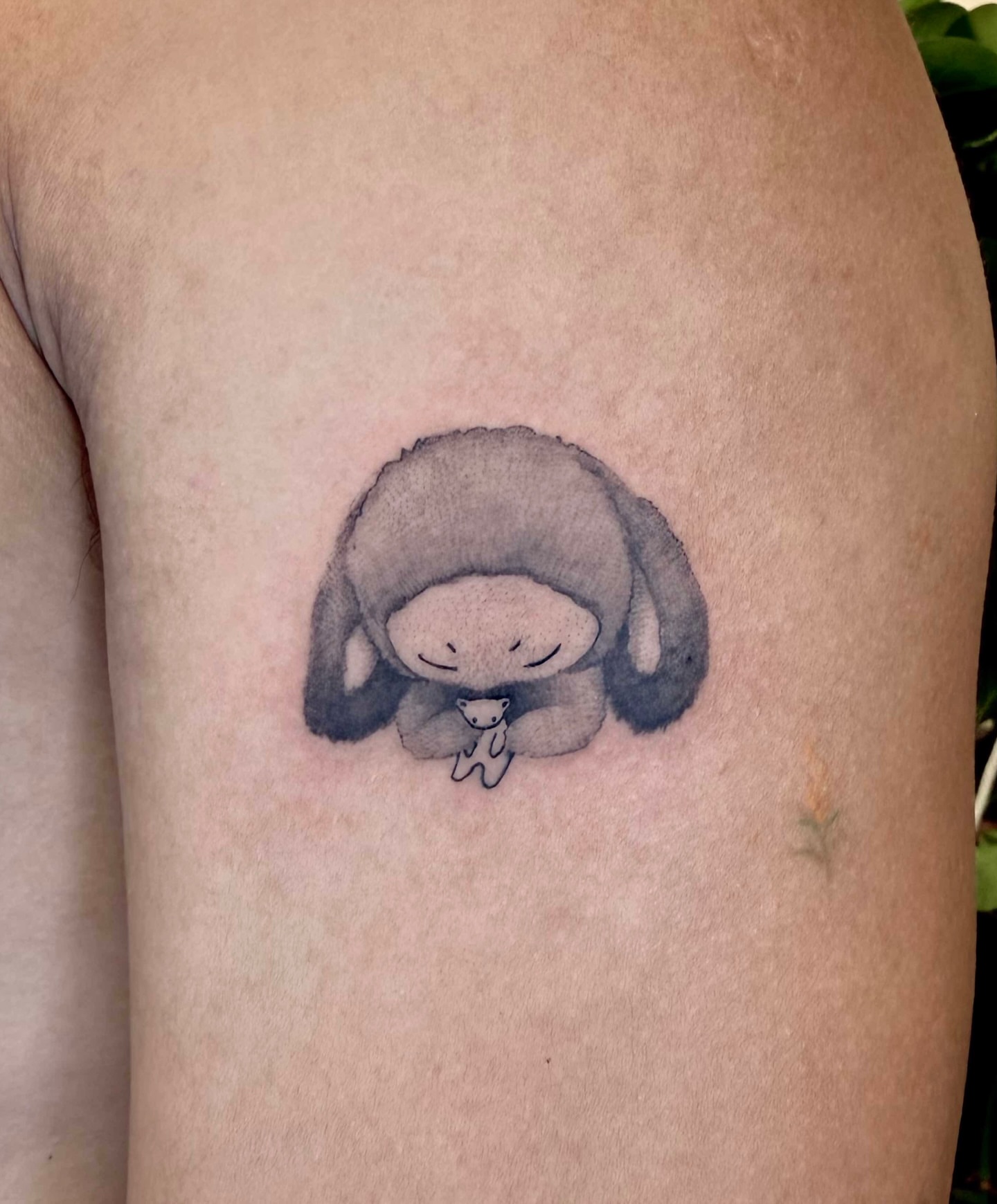 Sheep watercolor tattoo on the thigh by Xin Huang