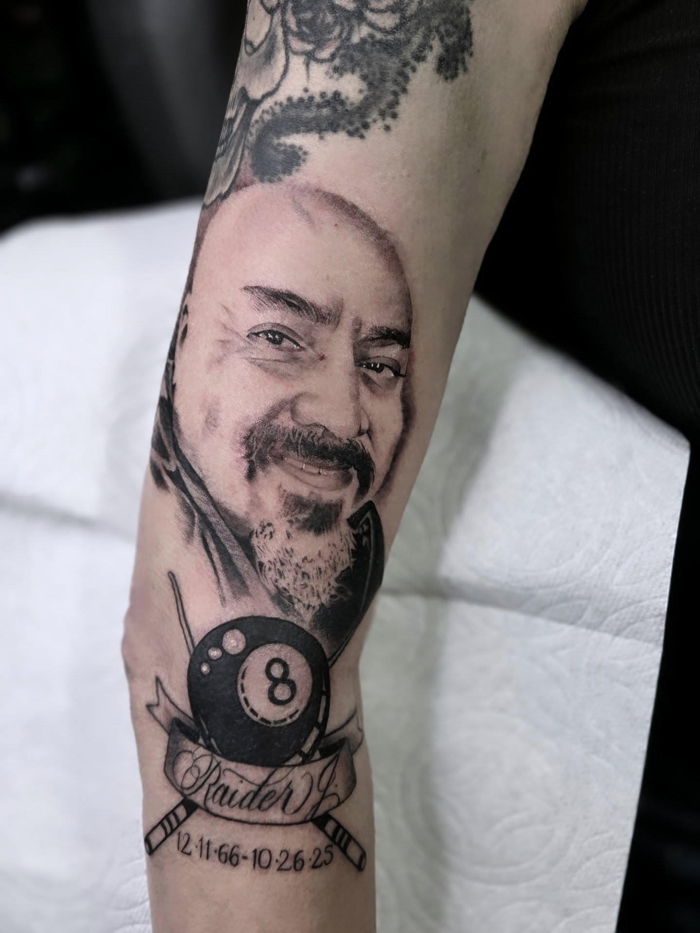 Portrait realism tattoo on the forearm by Yvette Cebreros