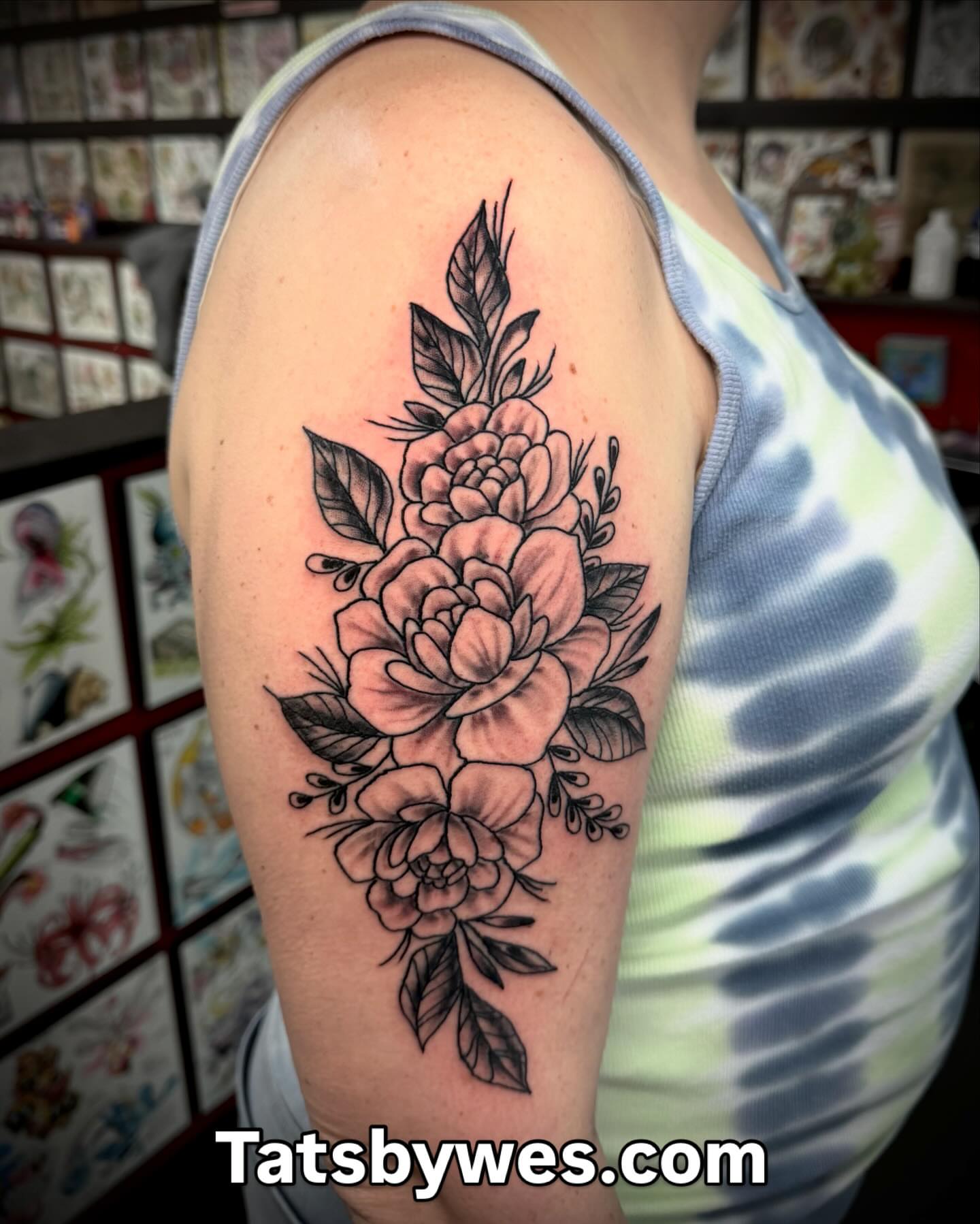 Floral bouquet black and grey tattoo on the shoulder by 𝐖𝐄𝐒