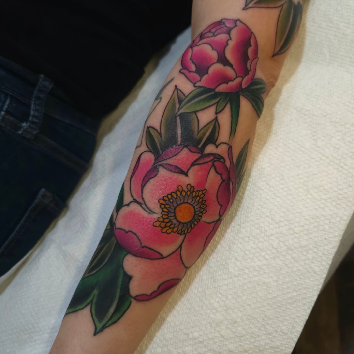 Peony flowers American traditional tattoo on the forearm by Justin Ballard, #Edmonds, Edmonds, Washington