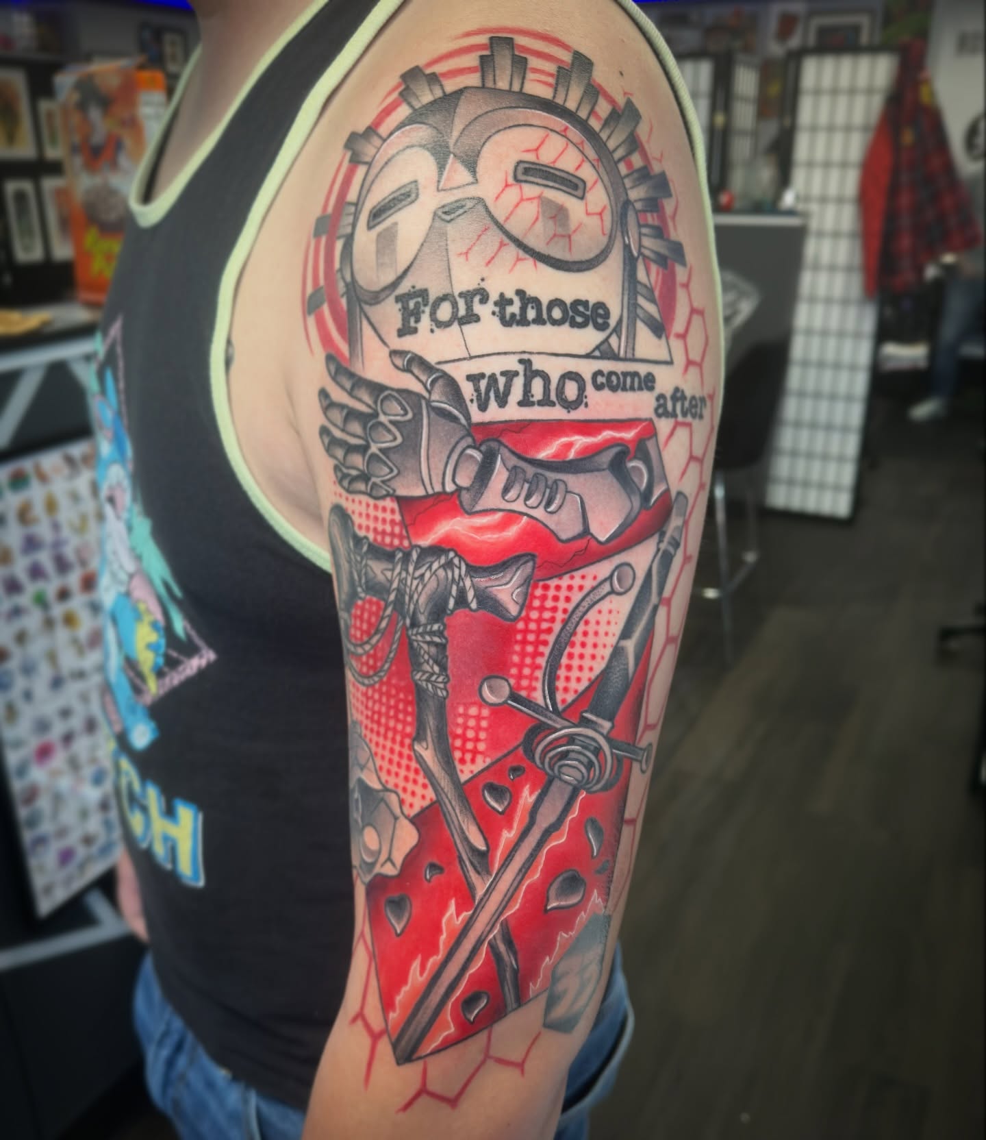Mask and sword American traditional tattoo on the forearm by Luke Mullins, Frederick, Maryland