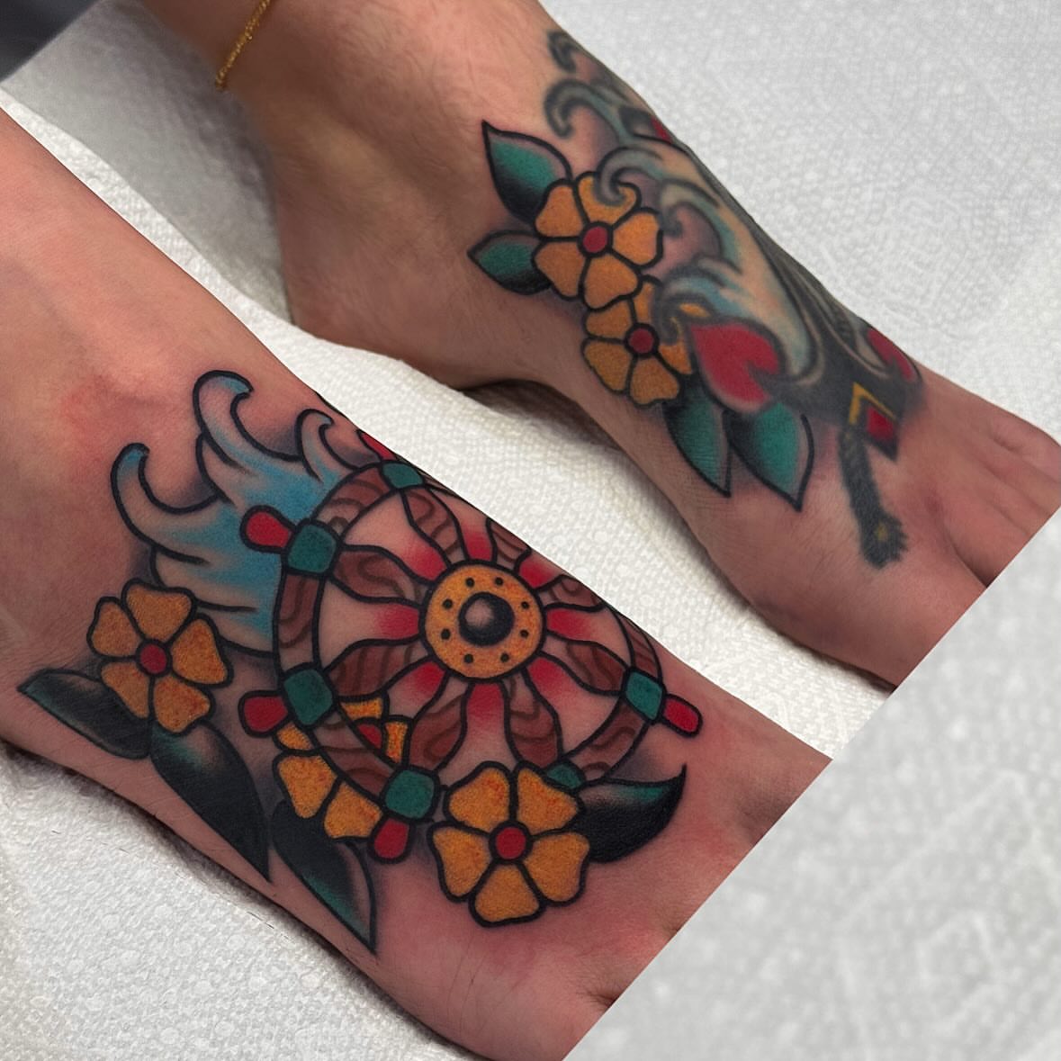 Mandala American traditional tattoo on the forearm by Larry Love