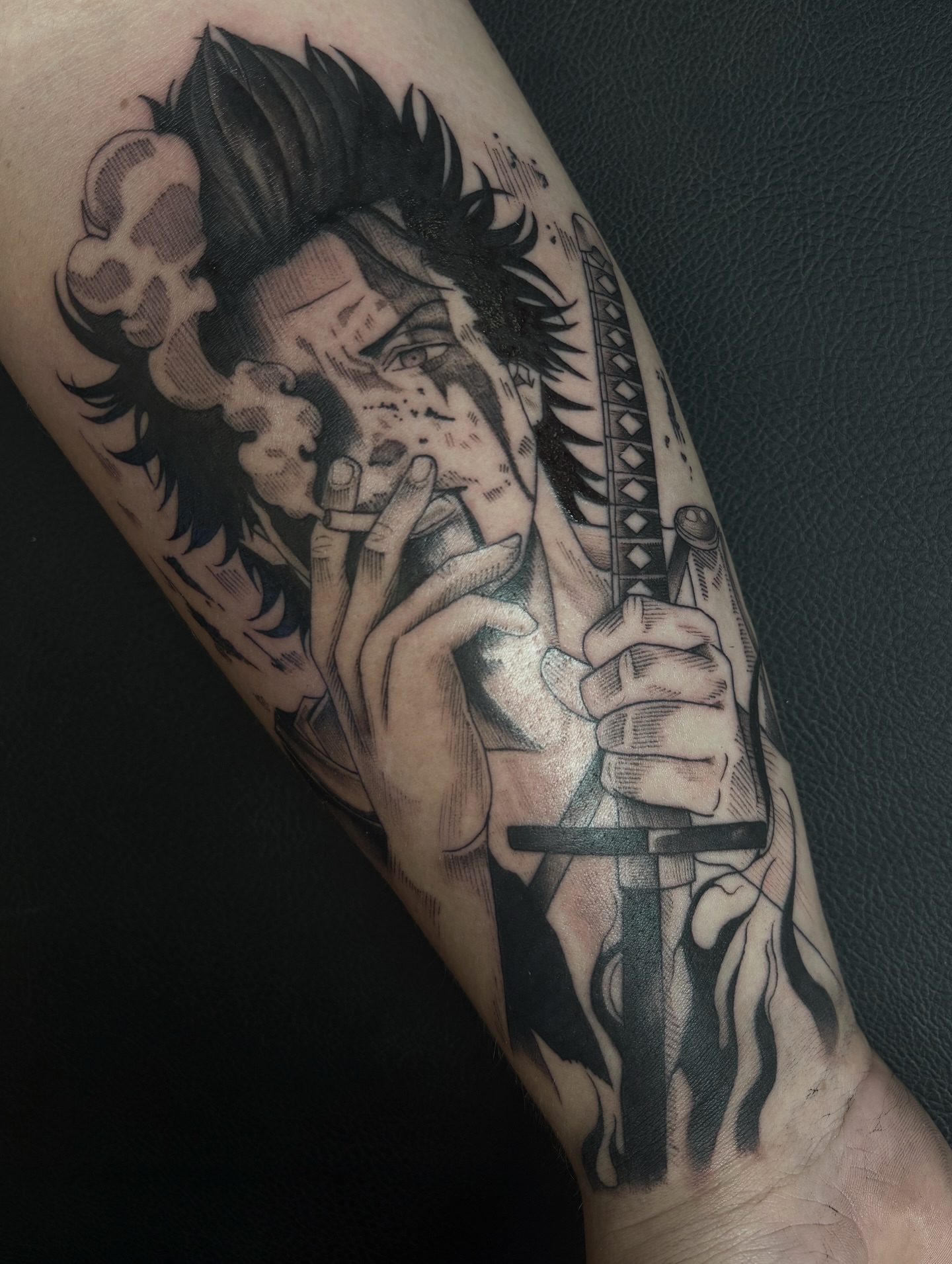Anime character anime tattoo on the forearm by Fine Line Tattoo Artist
