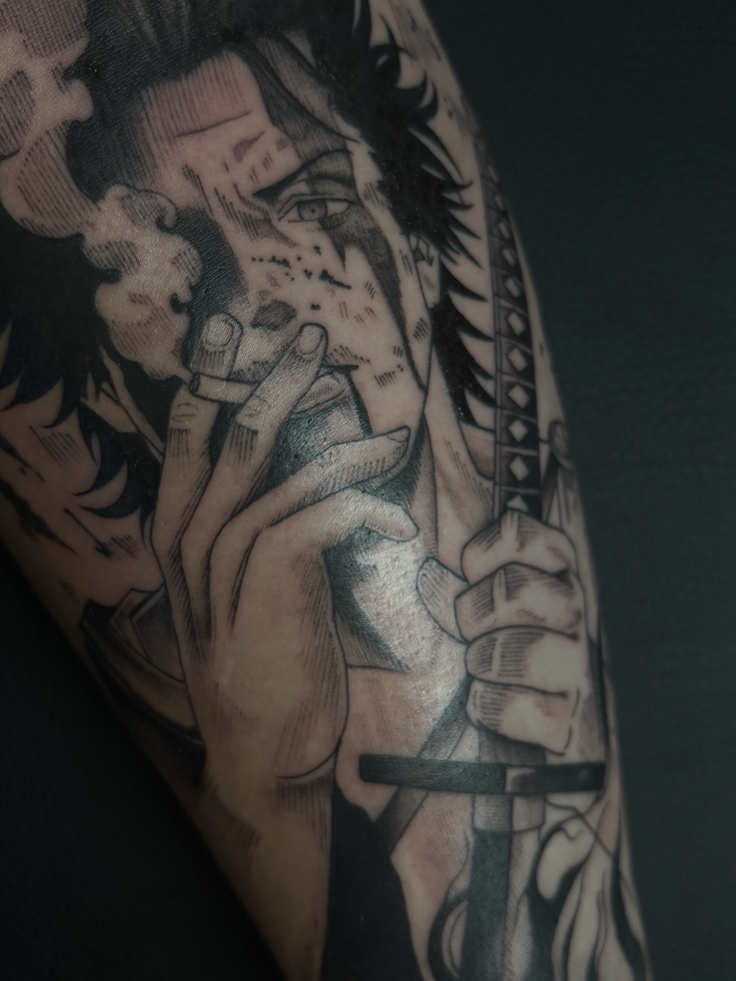 Smoking man realism tattoo on the forearm by Fine Line Tattoo Artist