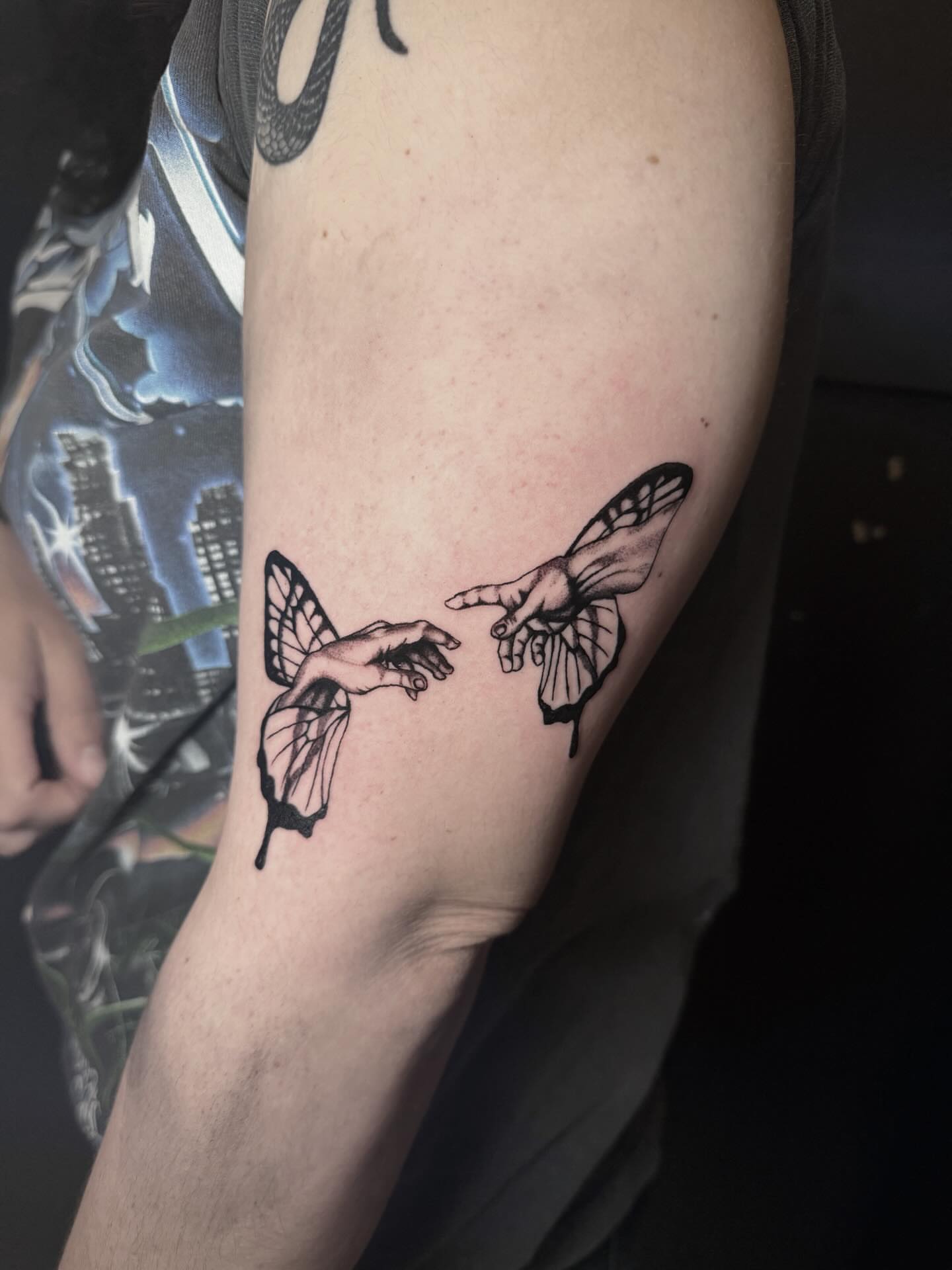 Creation moment realism tattoo on the forearm by Jess, Midvale, Utah