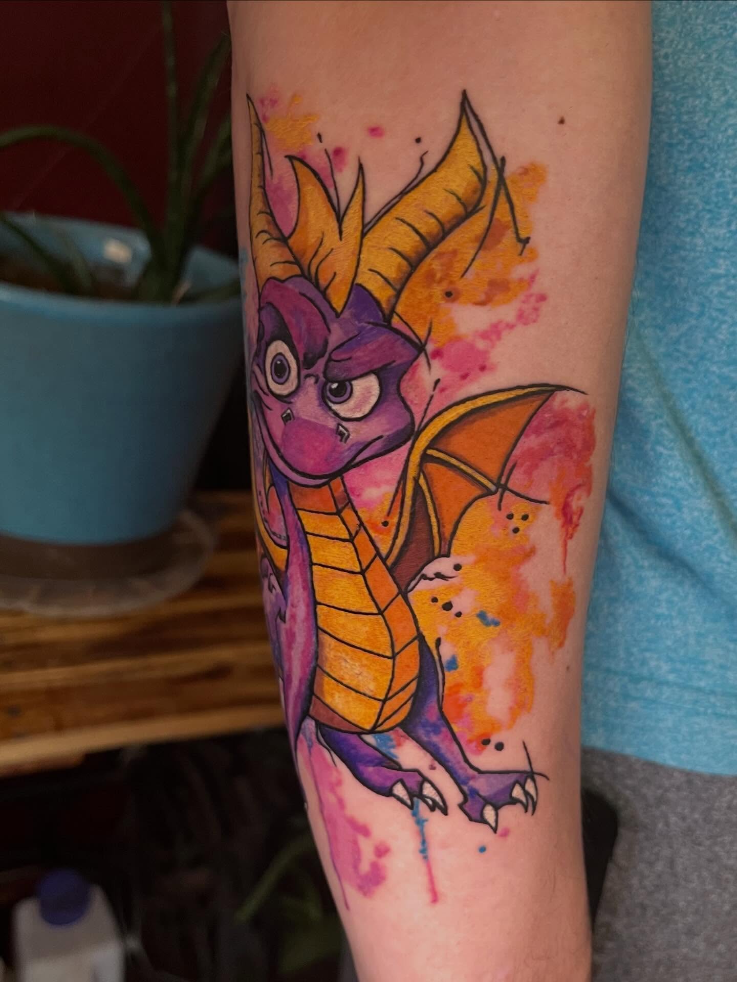 Spyro the Dragon watercolor tattoo on the forearm by Lenny Paul - Ohio Tattoo Artist, Canton, Ohio