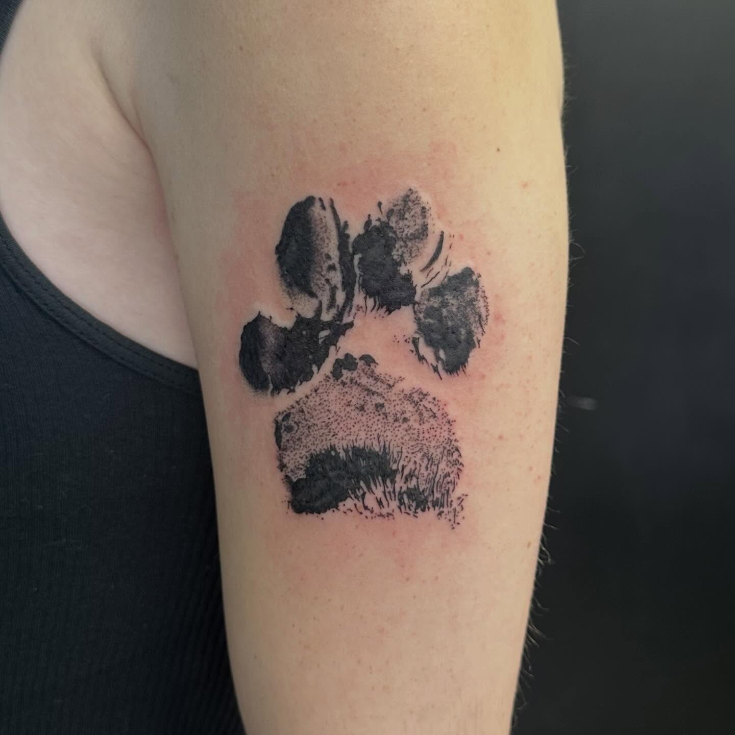 Paw print dotwork tattoo on the forearm by Victoria Parsons, Clarksville, Indiana