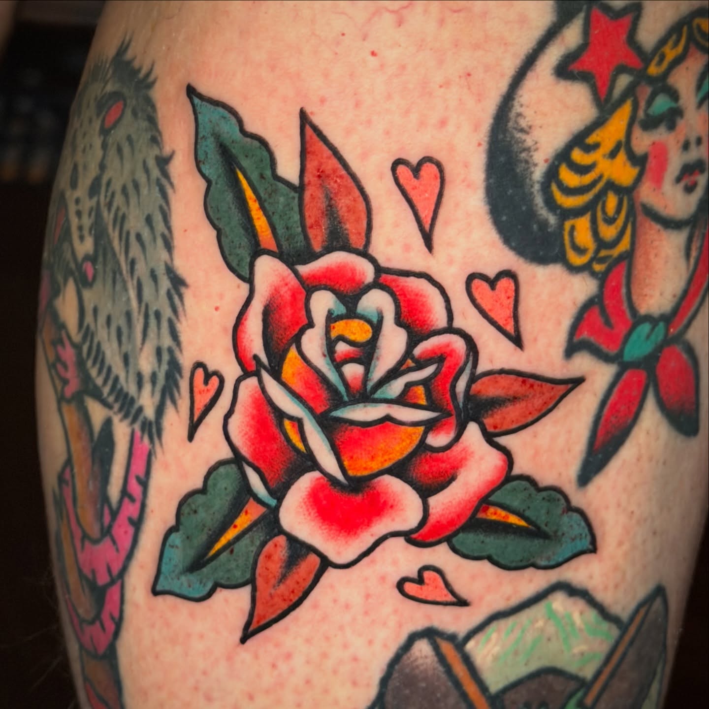 Rose American traditional tattoo on the upper arm by abbey pickens 🧚 cleveland ohio
