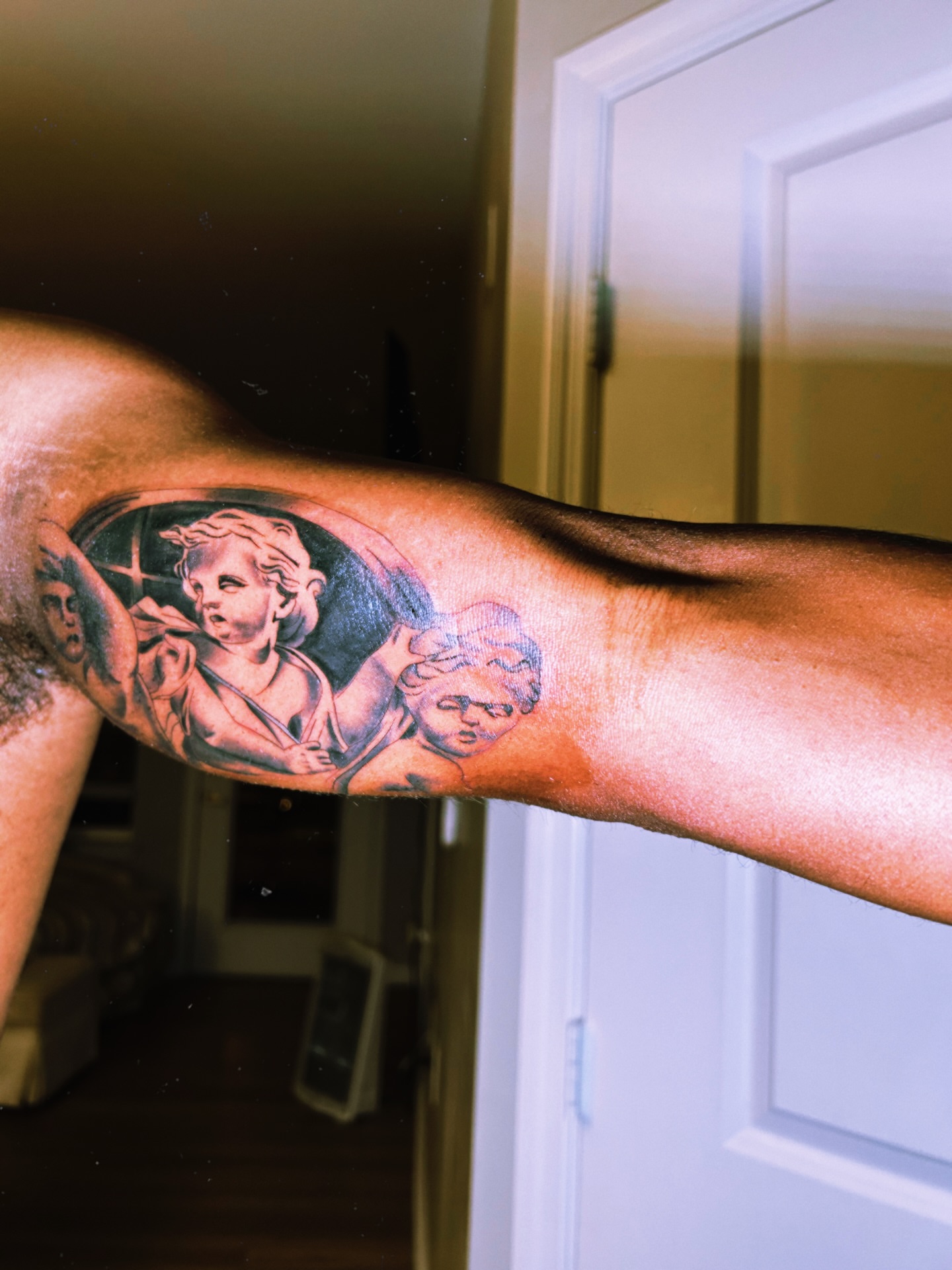 Angels realism tattoo on the forearm by Tito Cross ❤️‍🔥