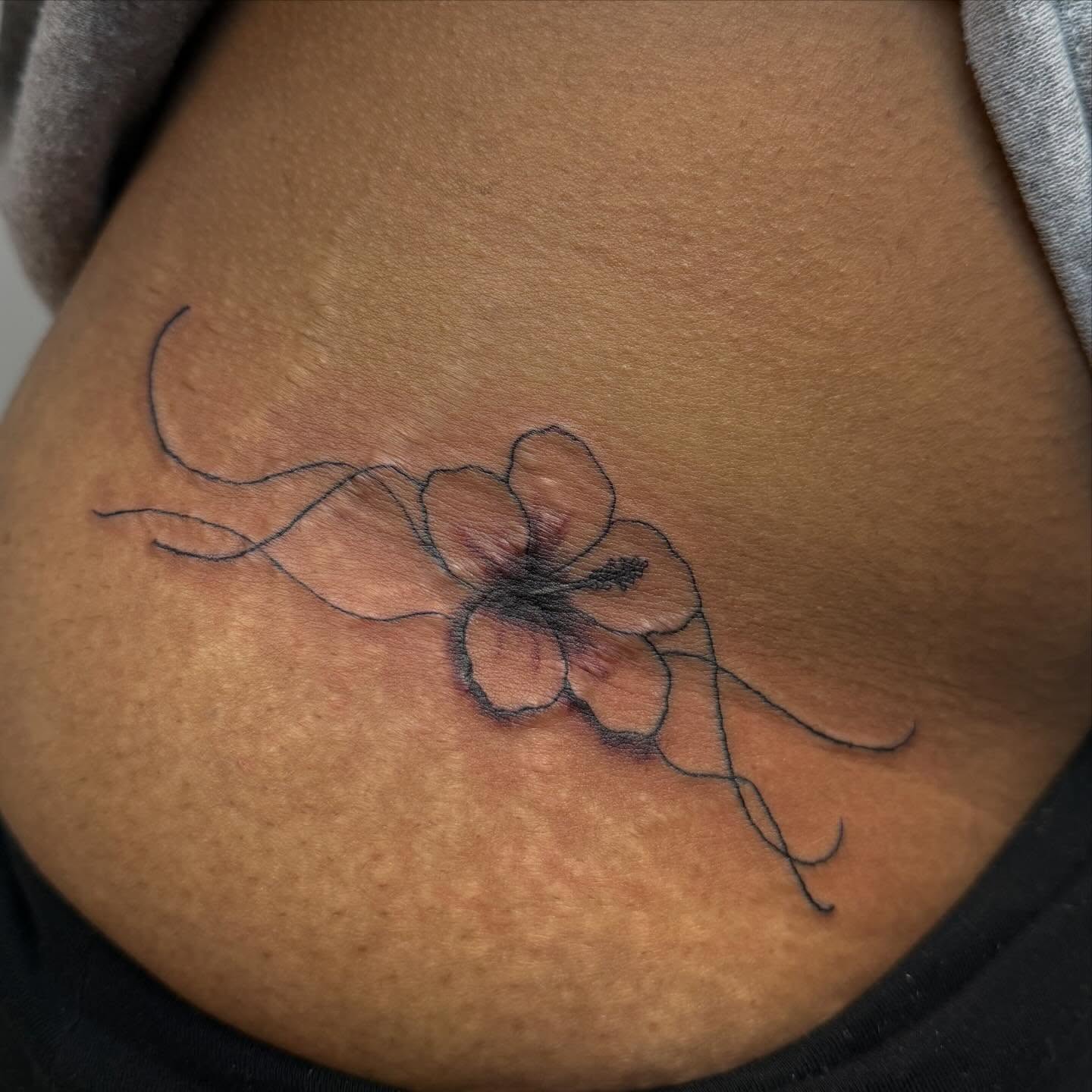 Flower black and grey tattoo on the thigh by XoXandrea.Ink, Kansas City, Missouri