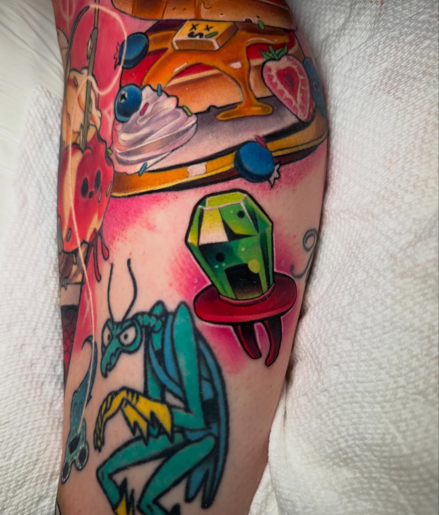 Insect and gem new school tattoo on the forearm by Kenneth Ruiz
