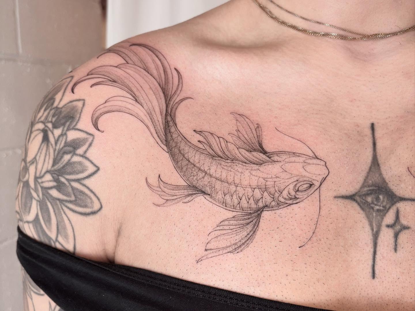 Goldfish realism tattoo on the chest by vaprol tattoo ✧ Boston