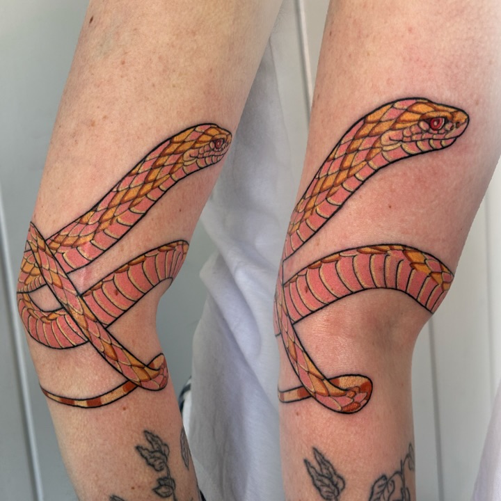 Snake geometric tattoo on the forearm by Anna Sylvan Tattoos