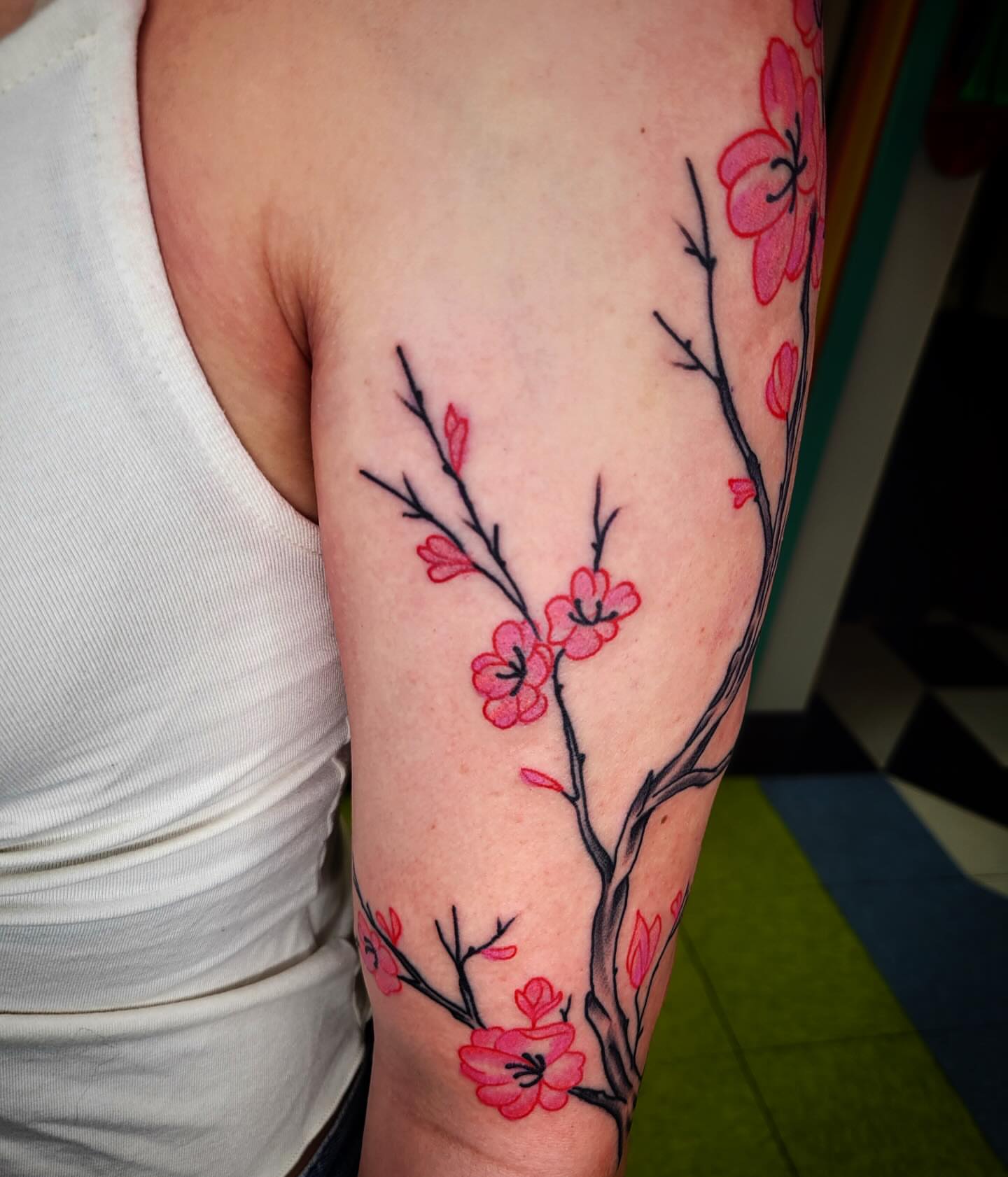 Cherry blossom branch dotwork tattoo on the forearm by joe martinez, Denver, Colorado