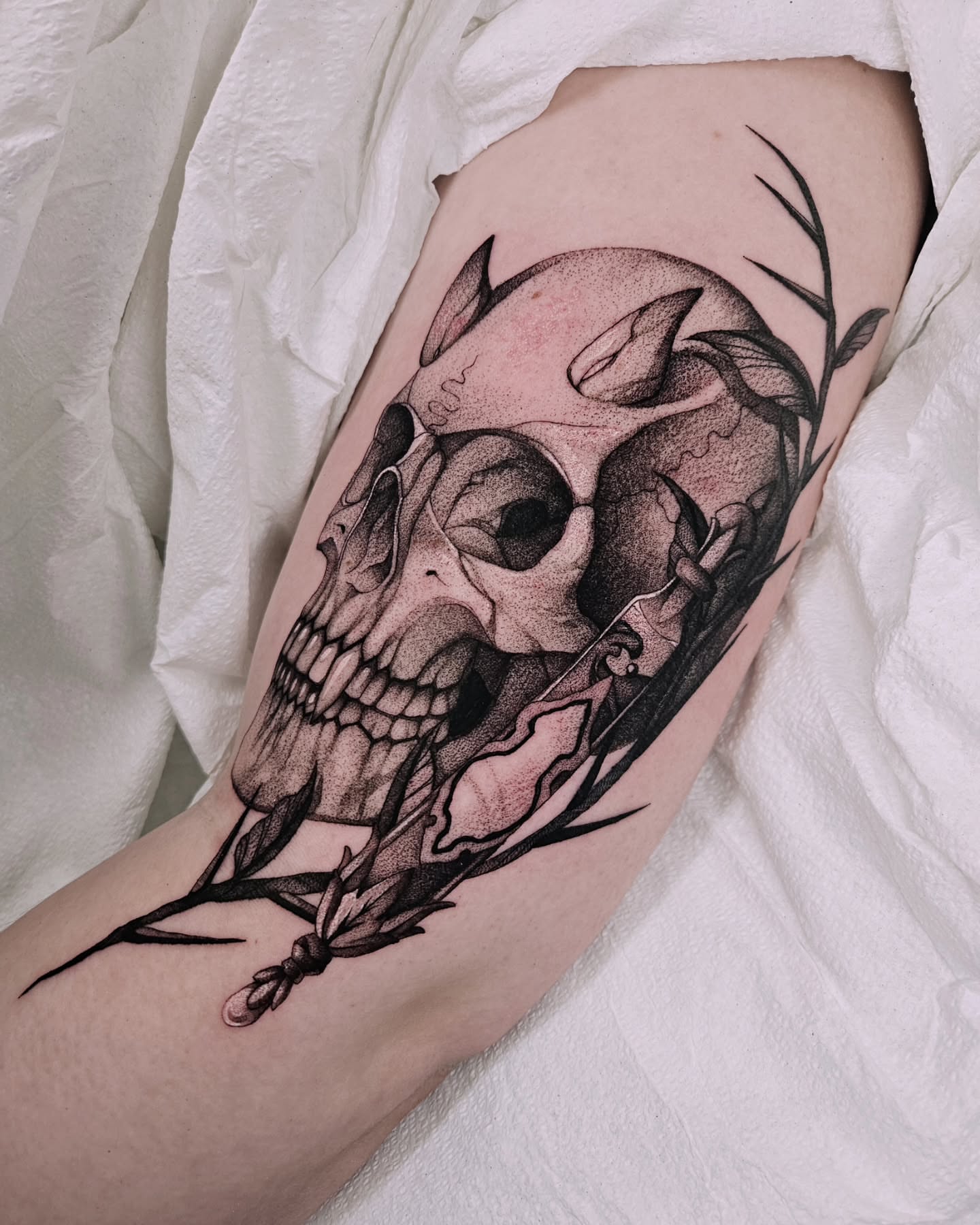 Skull dotwork tattoo on the forearm by Sabrina Wagner