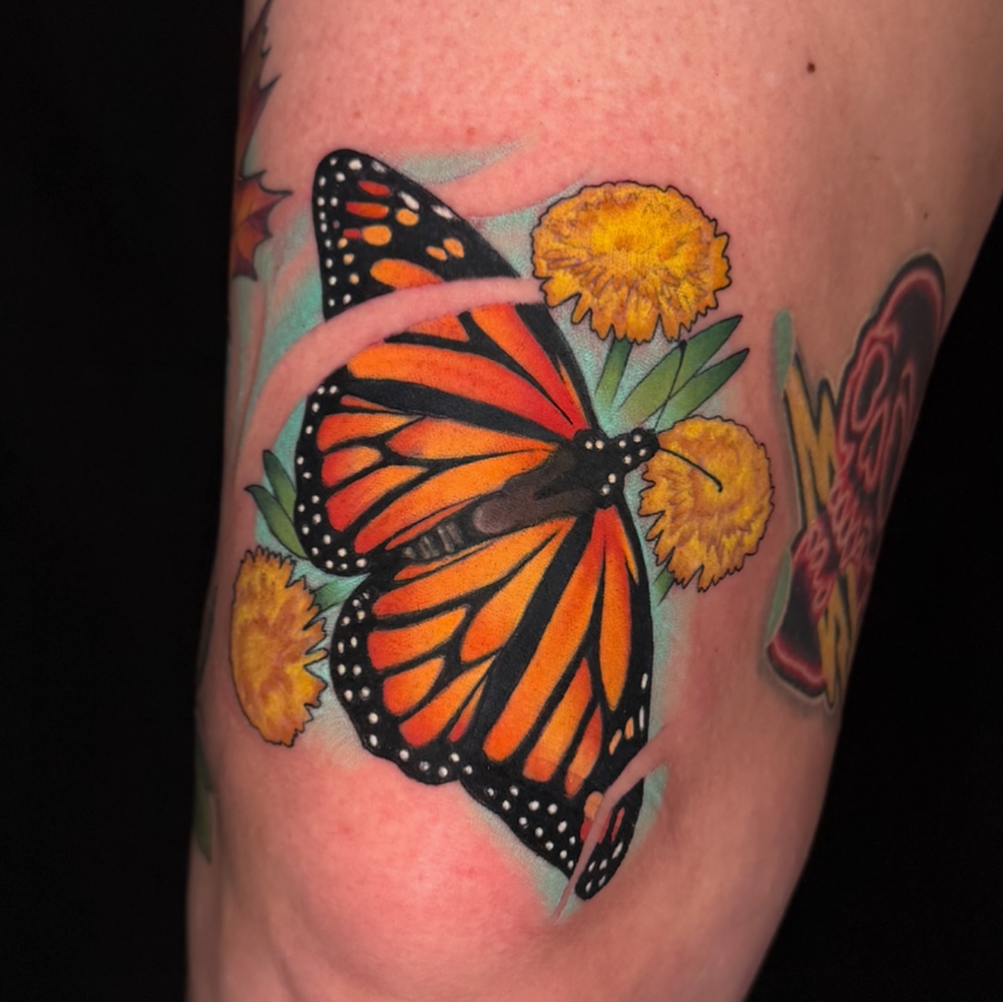 Monarch butterfly American traditional tattoo on the forearm by Pat Patterson Florida Tattoo Artist