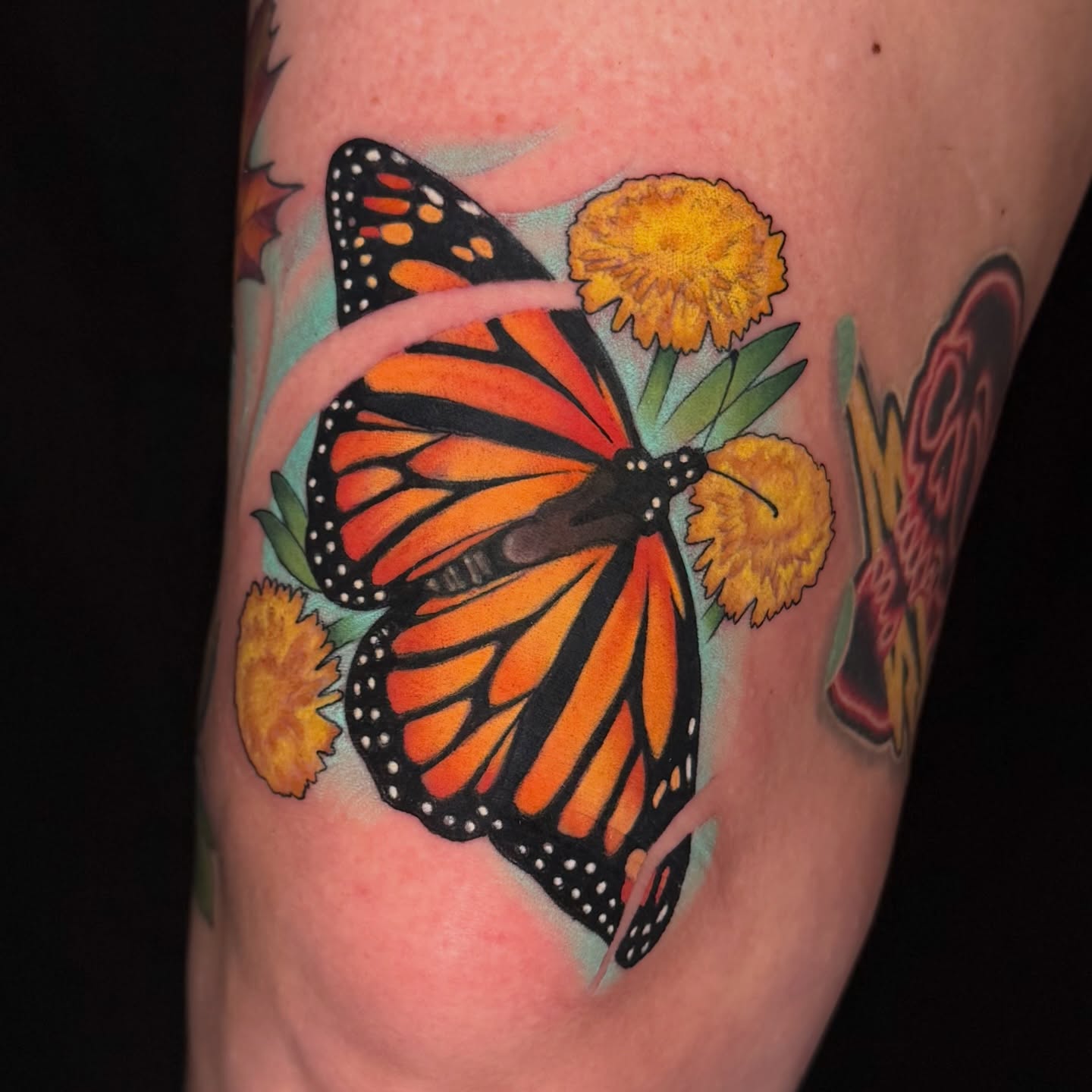 Monarch butterfly American traditional tattoo on the forearm by Pat Patterson Florida Tattoo Artist
