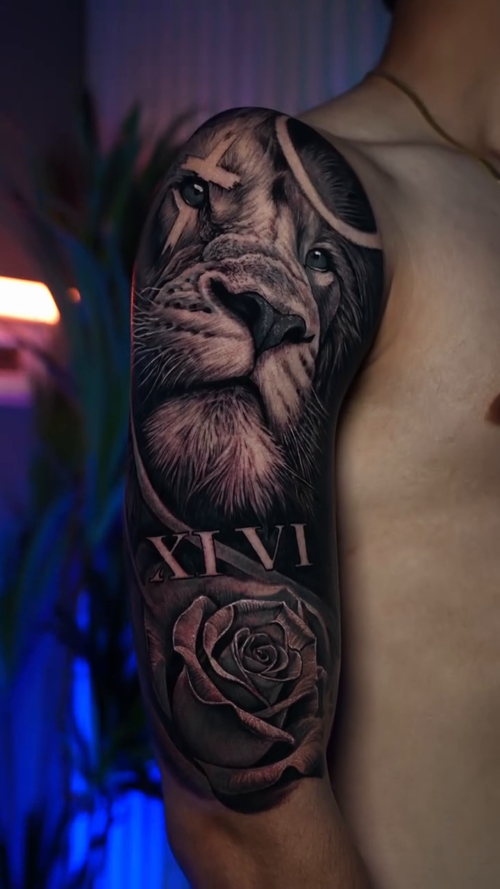 Lion and rose realism tattoo by Adrian Gonzalez