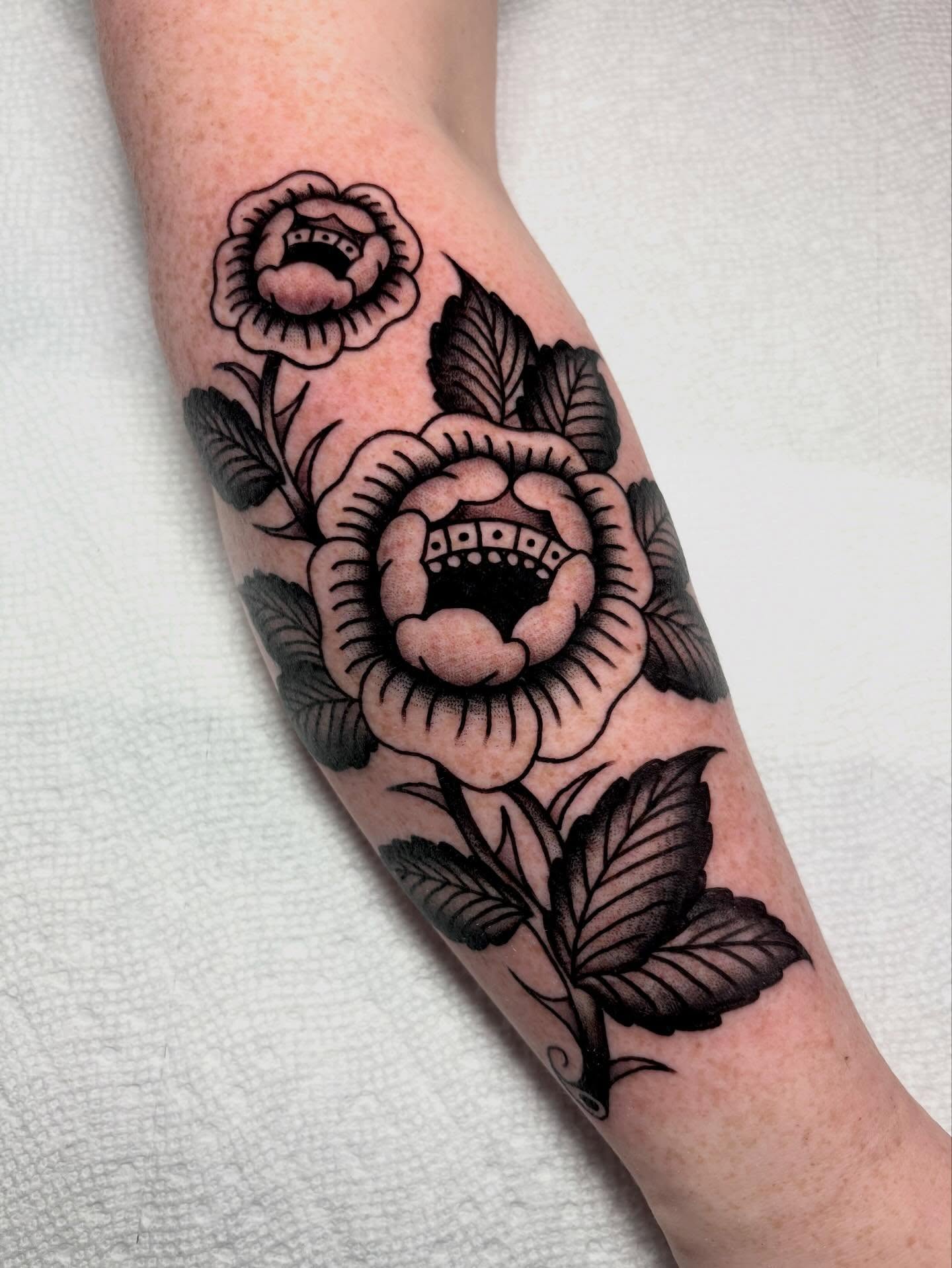Roses American traditional tattoo on the forearm by sally ★ lee
