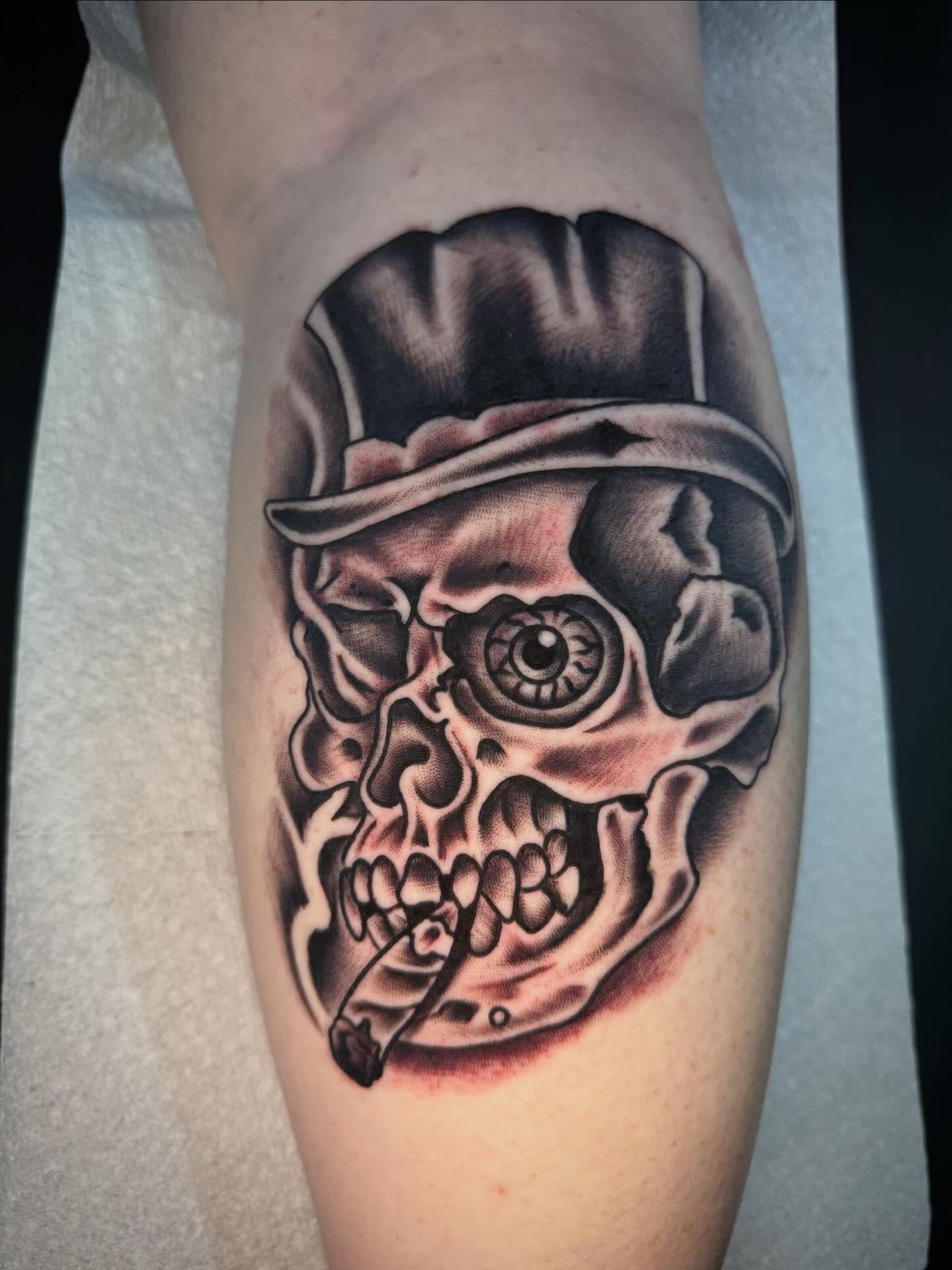 Skull wearing hat realism tattoo on the forearm by Jake Horstman, Dayton, Ohio