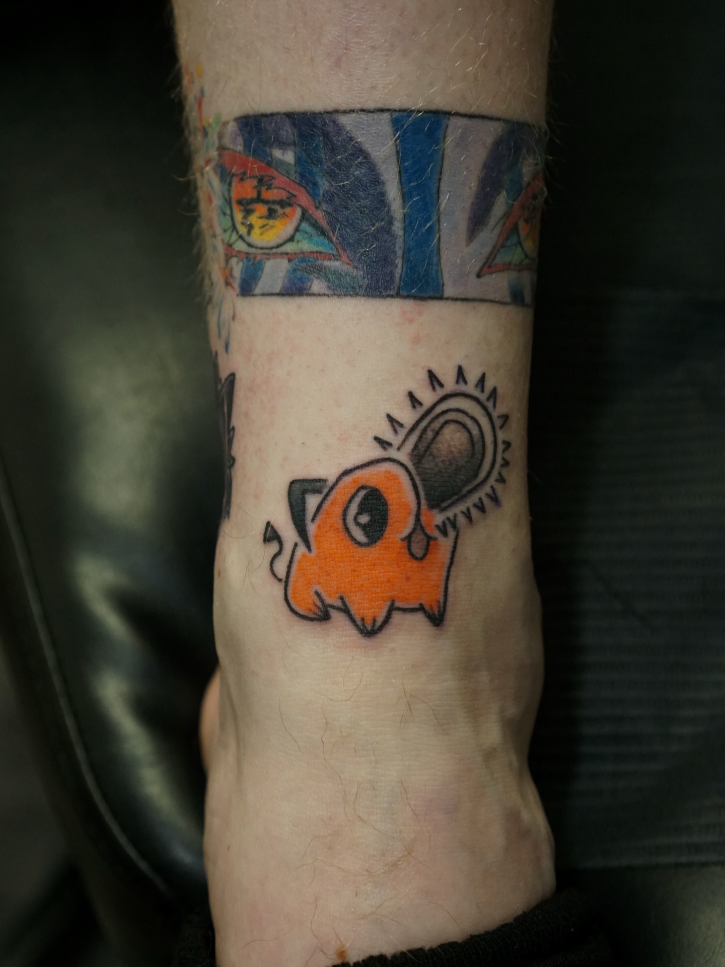 Ghost new school tattoo on the forearm by Nicholas Capellan, Winter Park, Florida