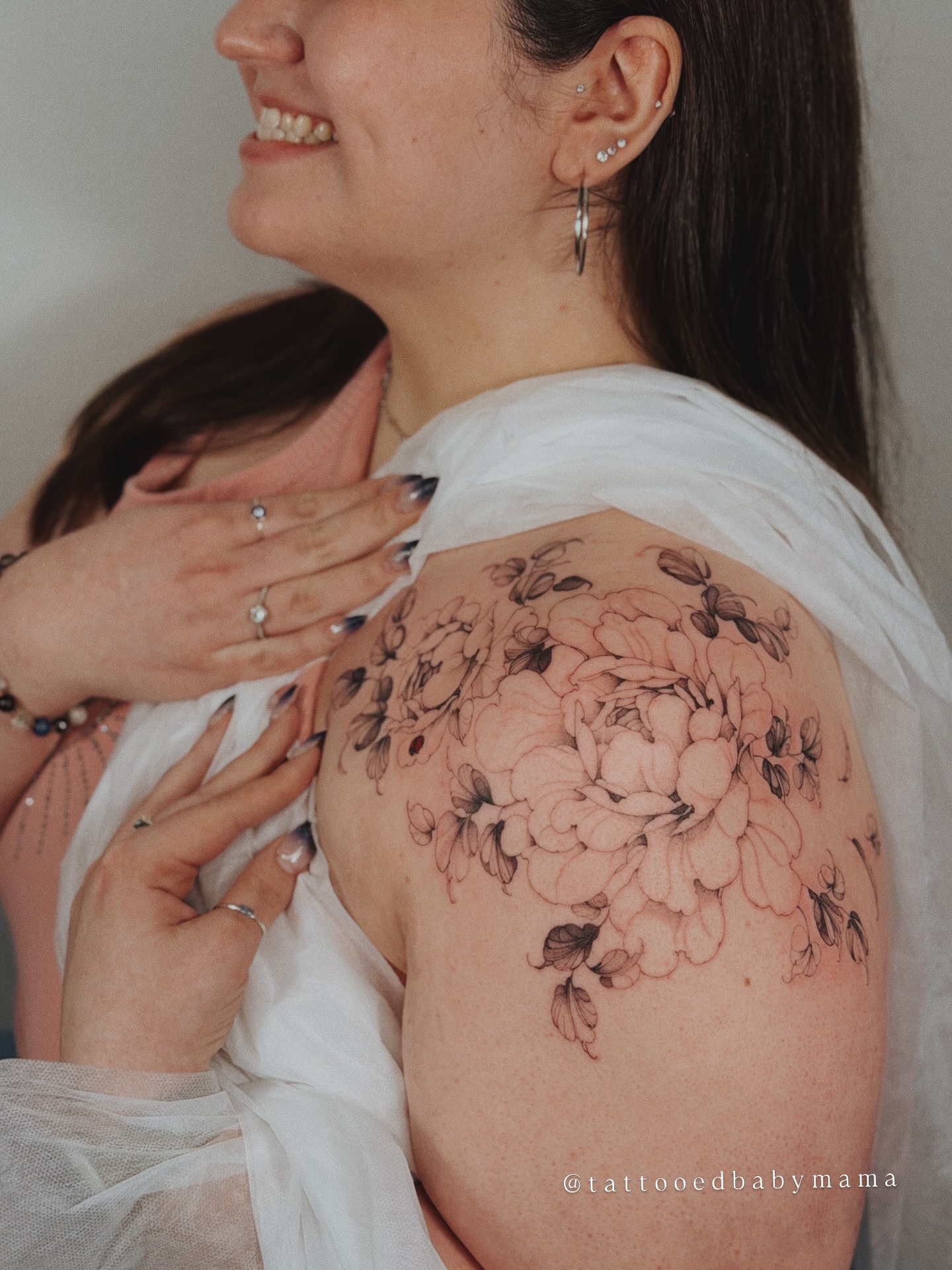 Floral bouquet black and grey tattoo on the shoulder by Andrea Evangelista