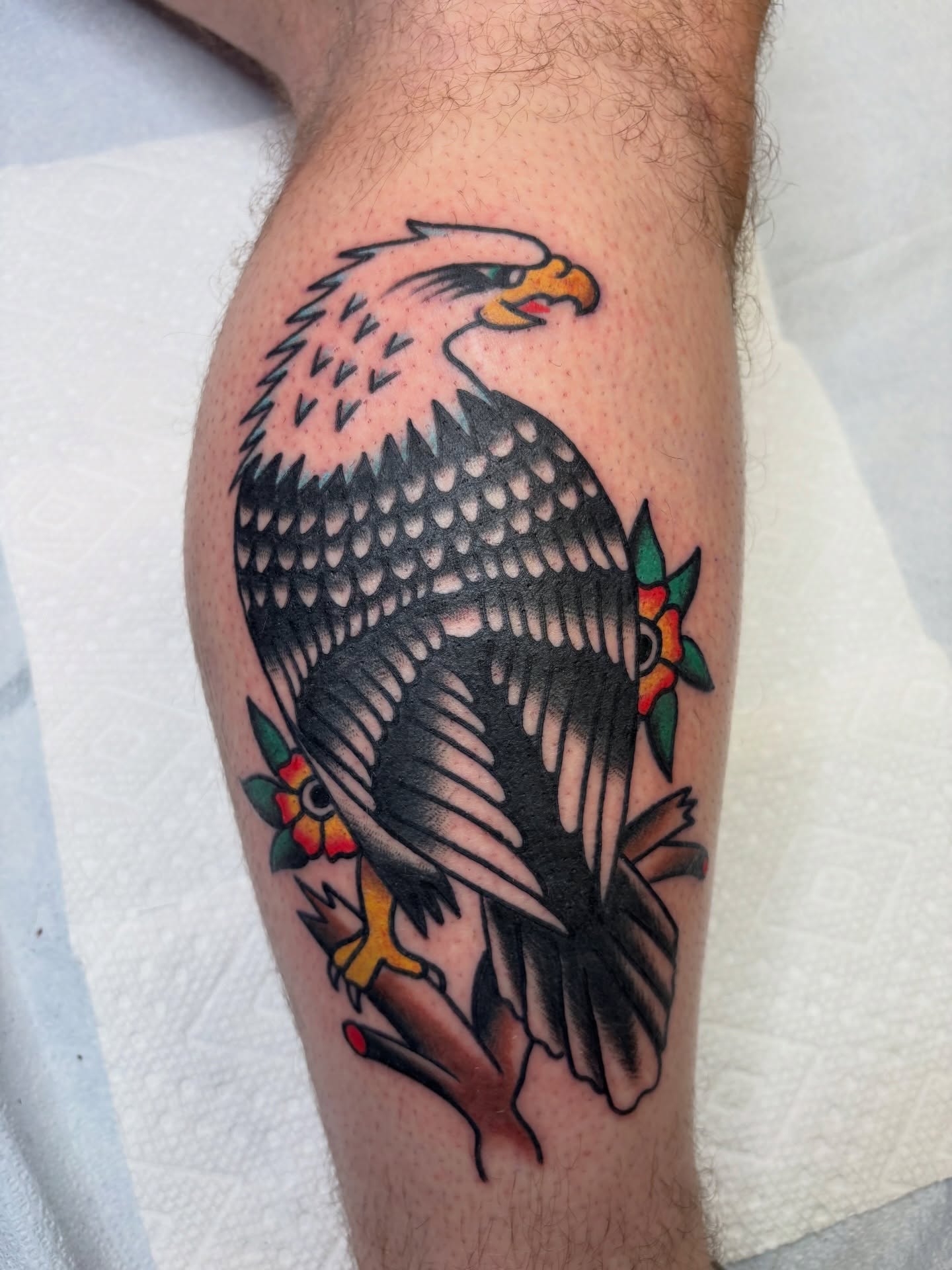 Eagle American traditional tattoo on the thigh by Cooper Reichwein