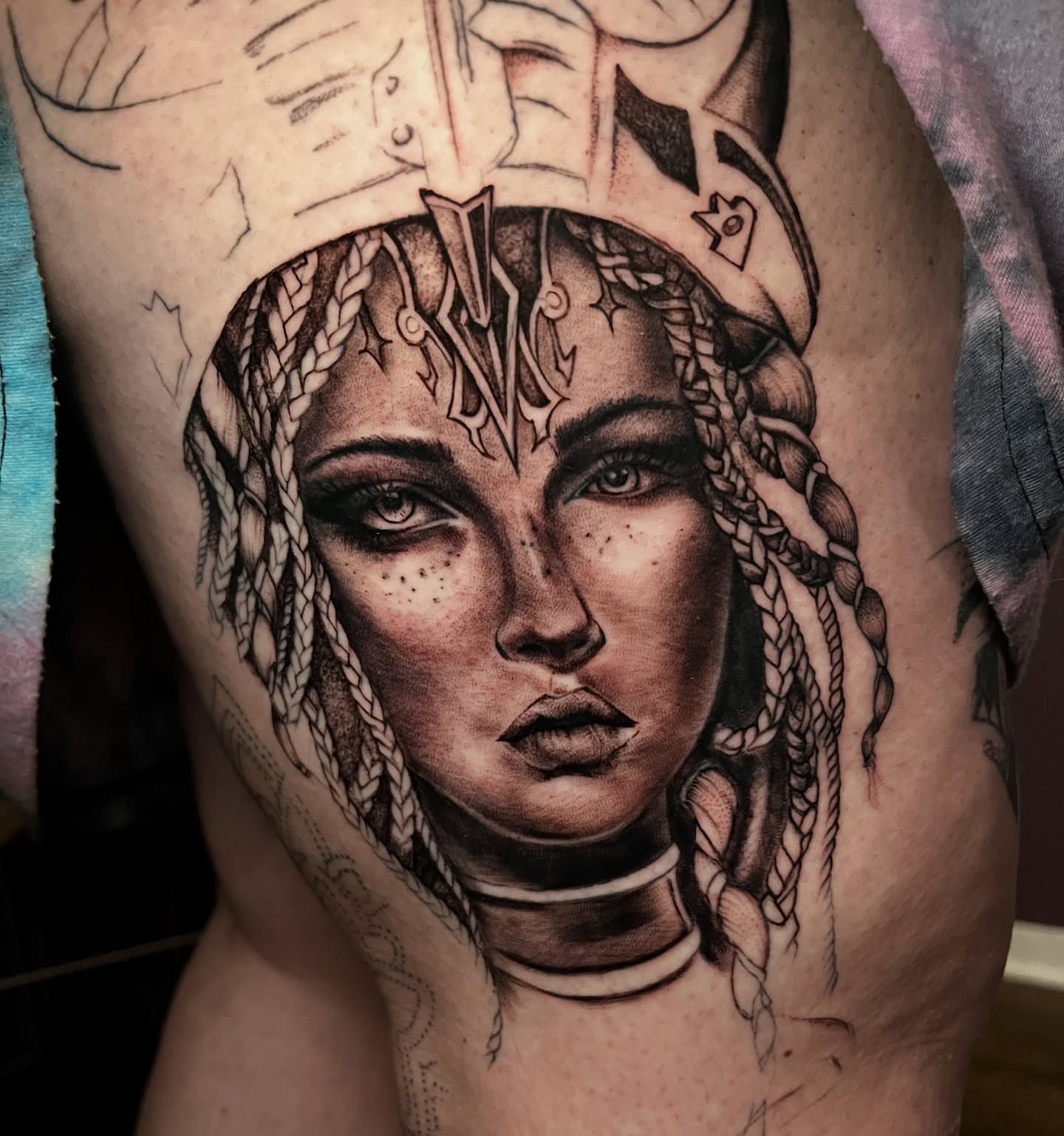 Woman with braids realism tattoo on the thigh by SJ