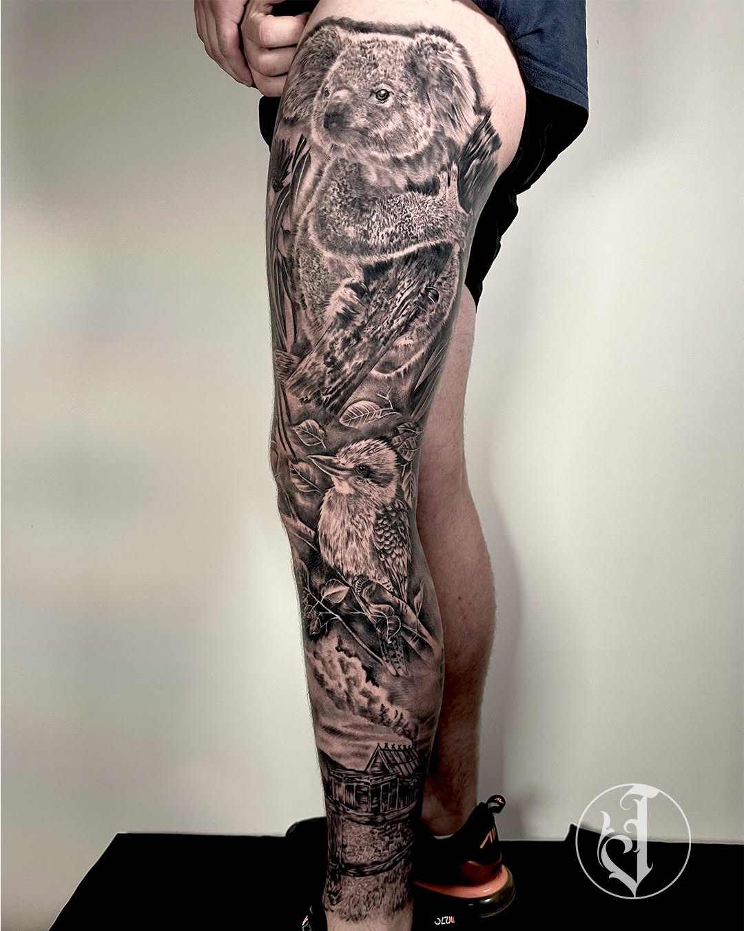 Koala, kookaburra, and house Japanese tattoo on the leg by Tattoos By Josh