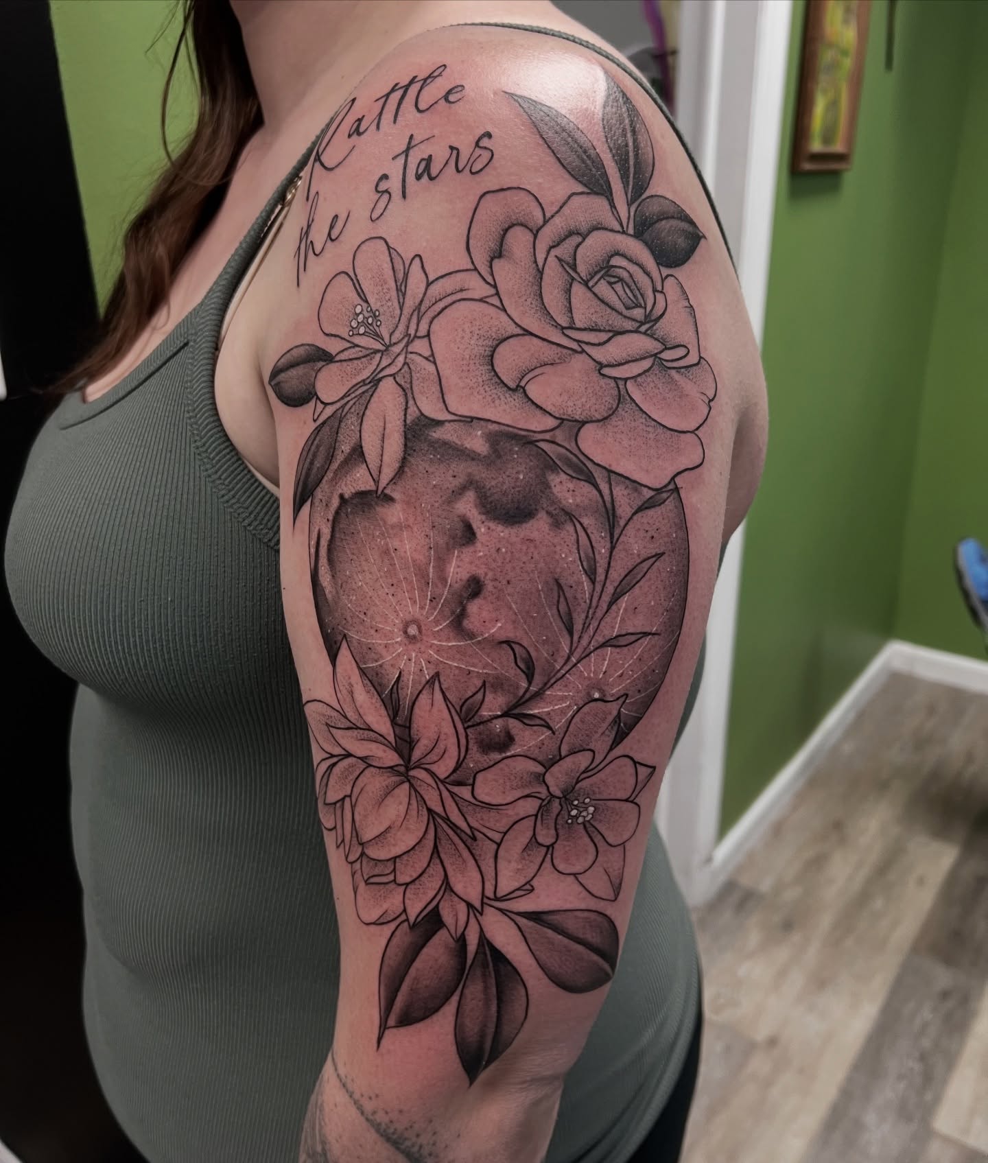 Flower and moon dotwork tattoo on the shoulder by Olivia Suzanne Fada