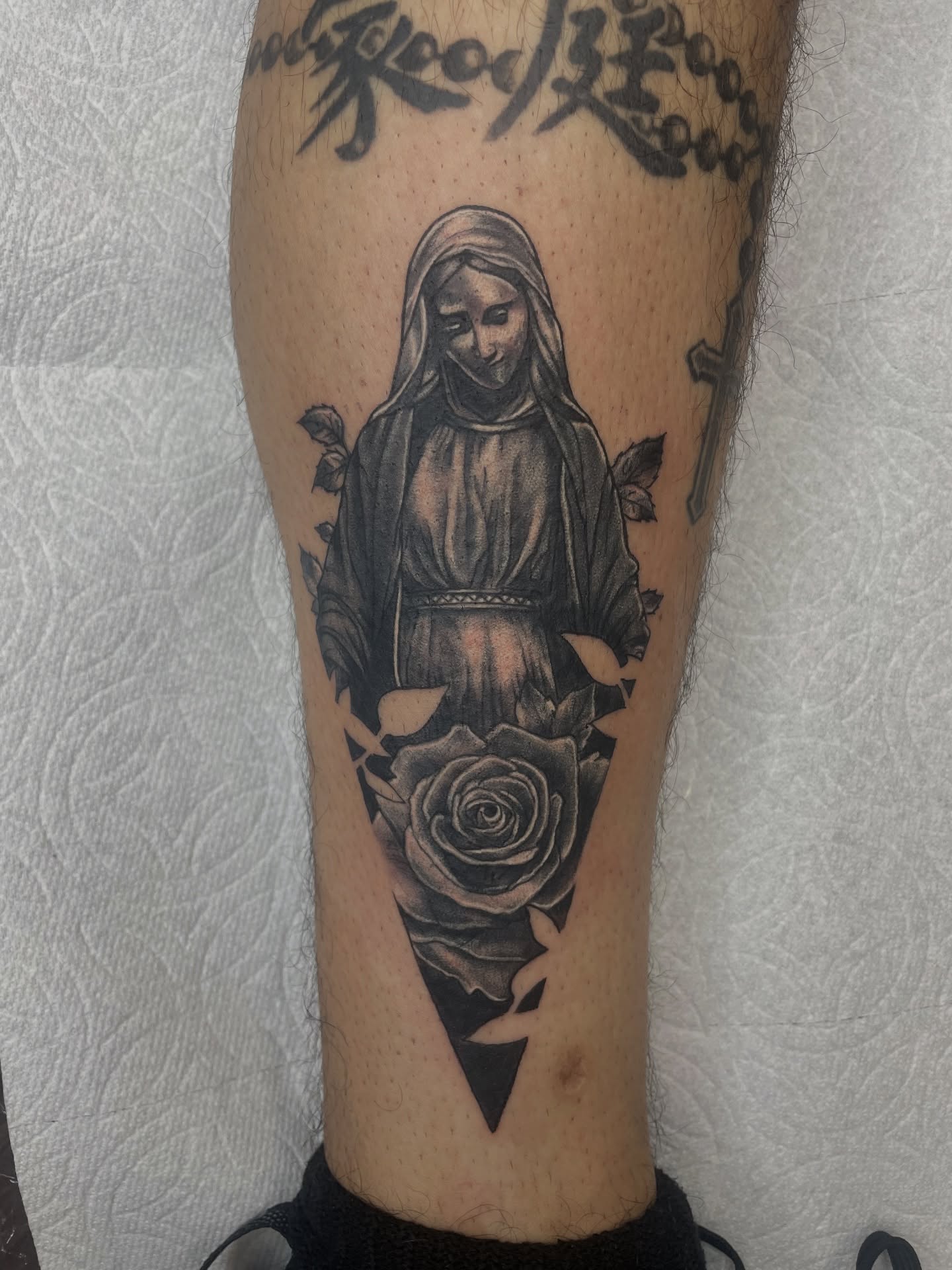 Tattoo by @artist_usual — black_and_grey, realism