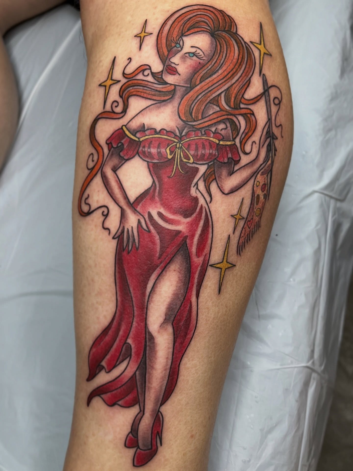 Red dress woman American traditional tattoo on the thigh by Michigan Tattoo Artist - Nadia Garver, Clinton Township, Michigan